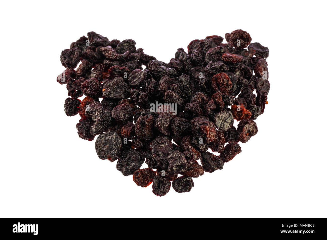 Dried black cherries isolated on white background Stock Photo Alamy