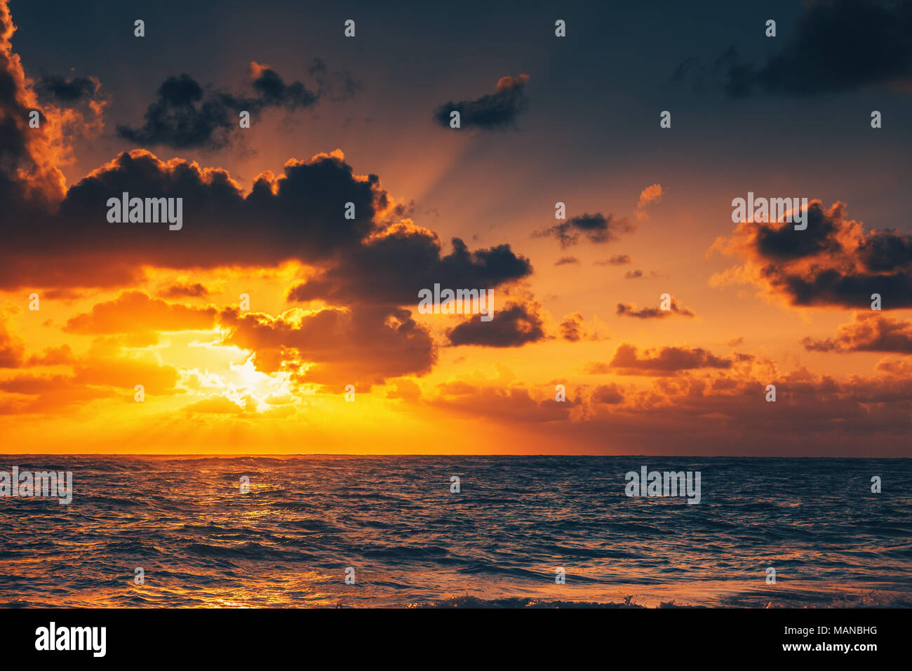 Beautiful cloudscape over the sea, sunrise shot Stock Photo - Alamy