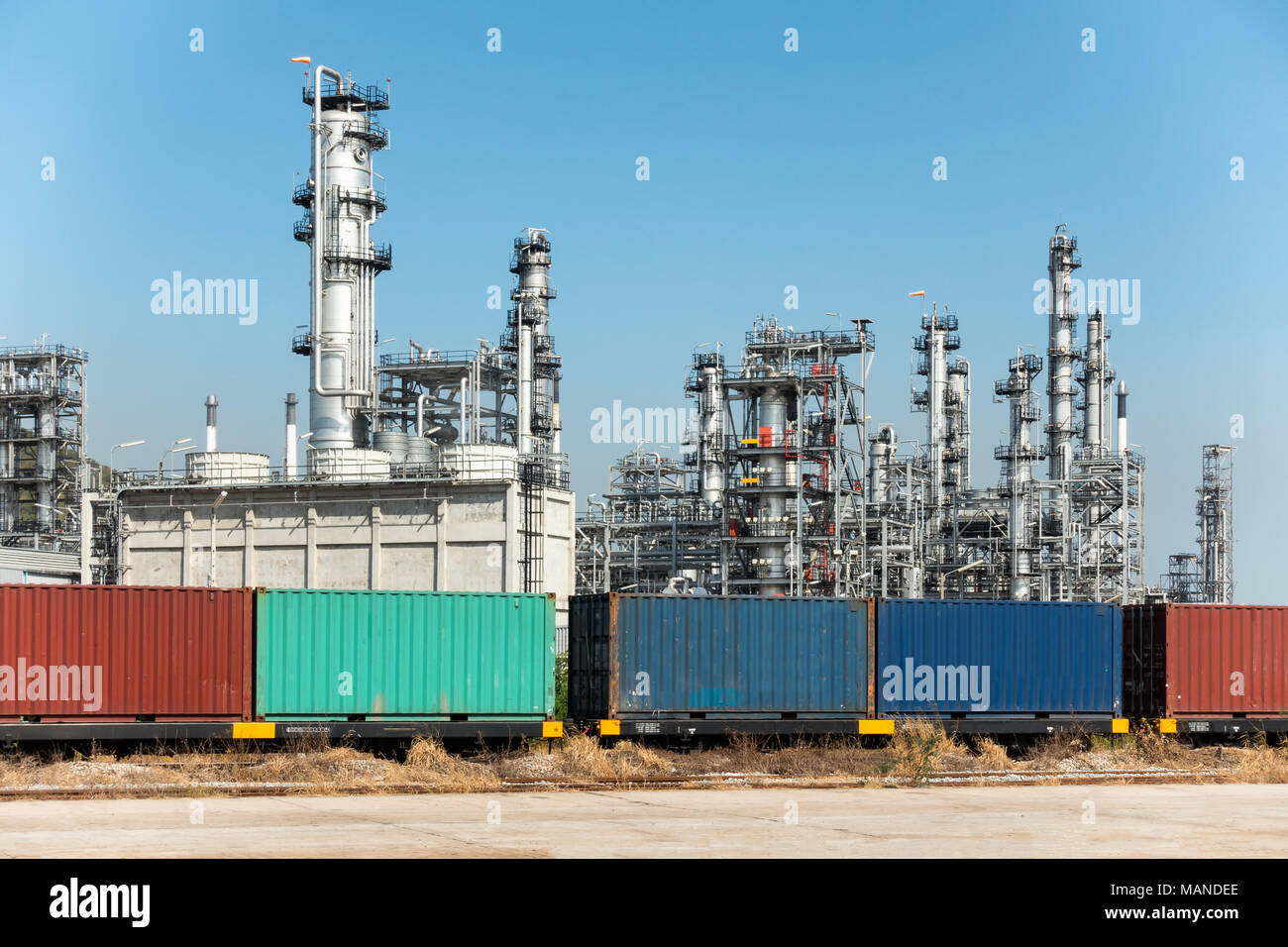 oil refinery and container shipping on daylight Stock Photo