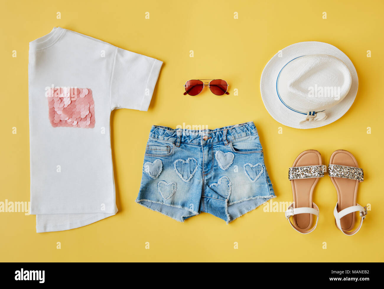 Flat Lay Shot Of Female Summer Clothing Stock Photo