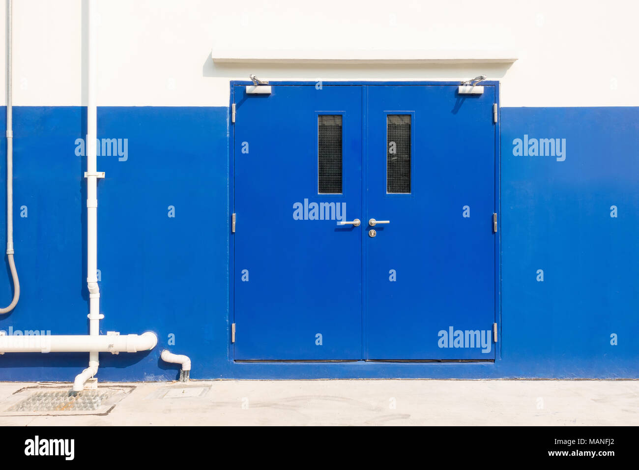 Industrial swing door and fire resistance door Stock Photo Alamy