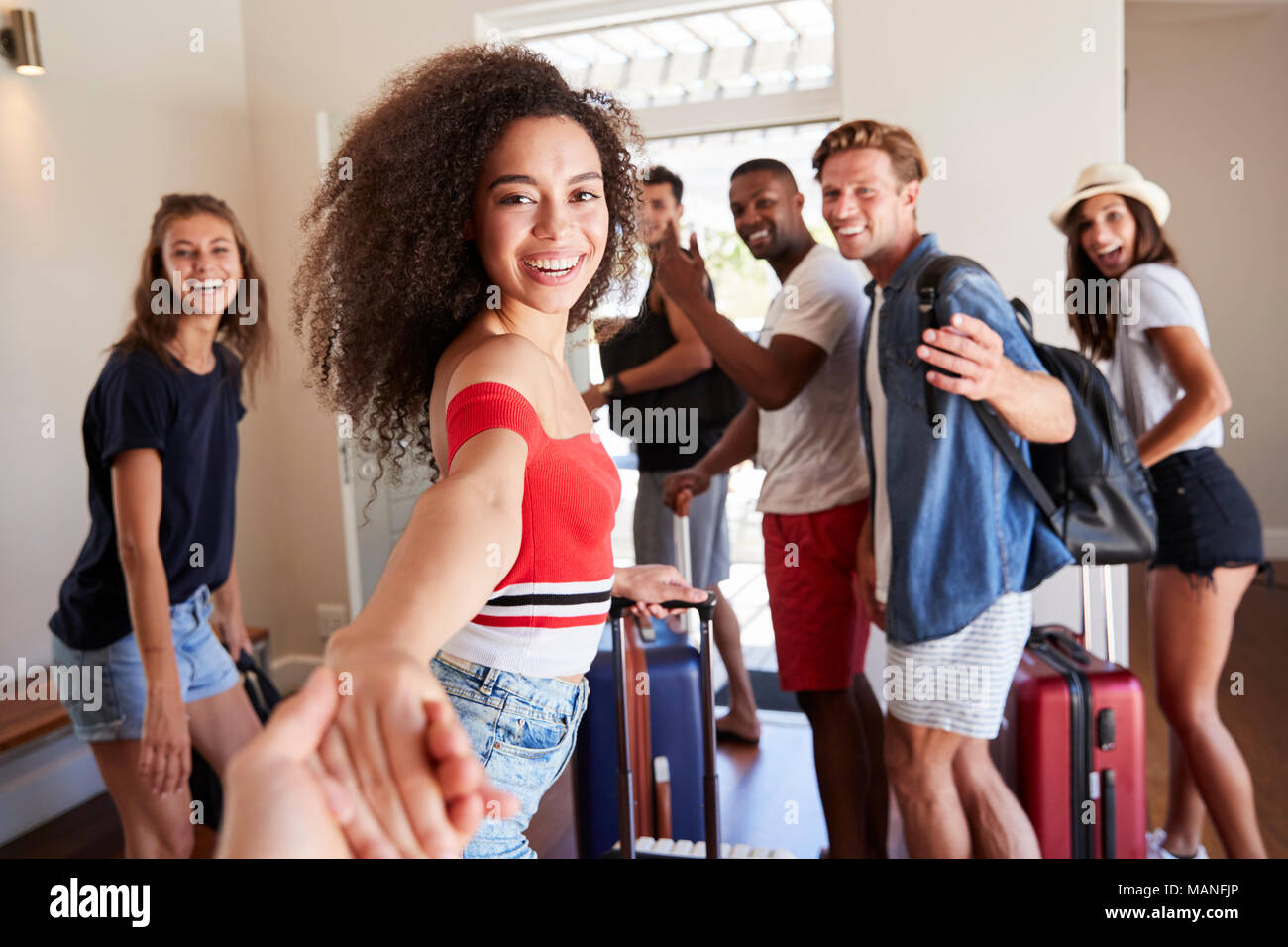 Point Of View Shot Of Friends Leaving Summer Vacation Rental Stock Photo