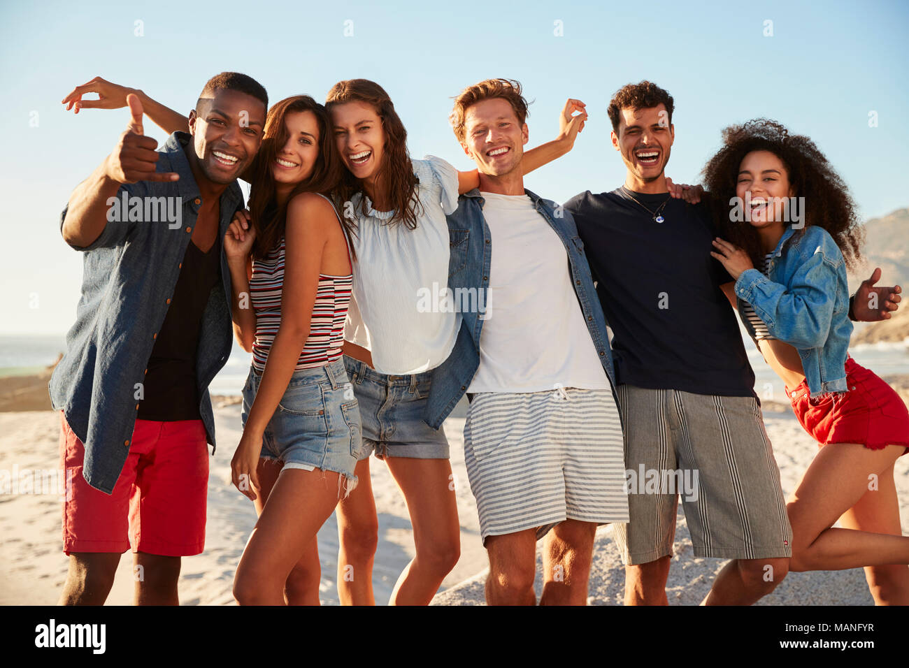 Portrait Of Friends Having Fun Together On Beach Vacation Stock Photo