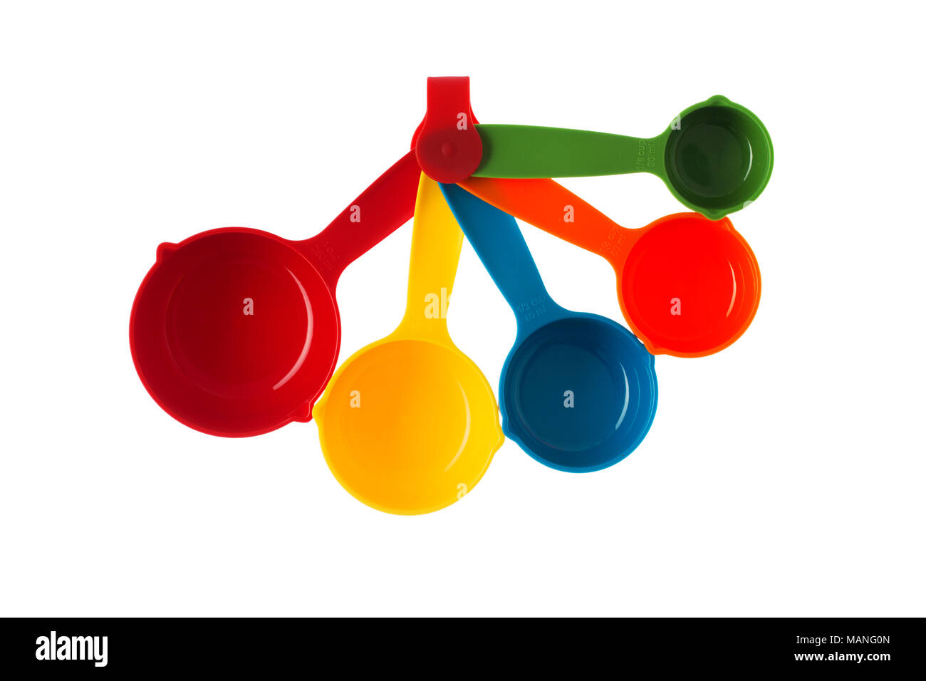 Color plastic dosing spoons isolated on a white background Stock Photo