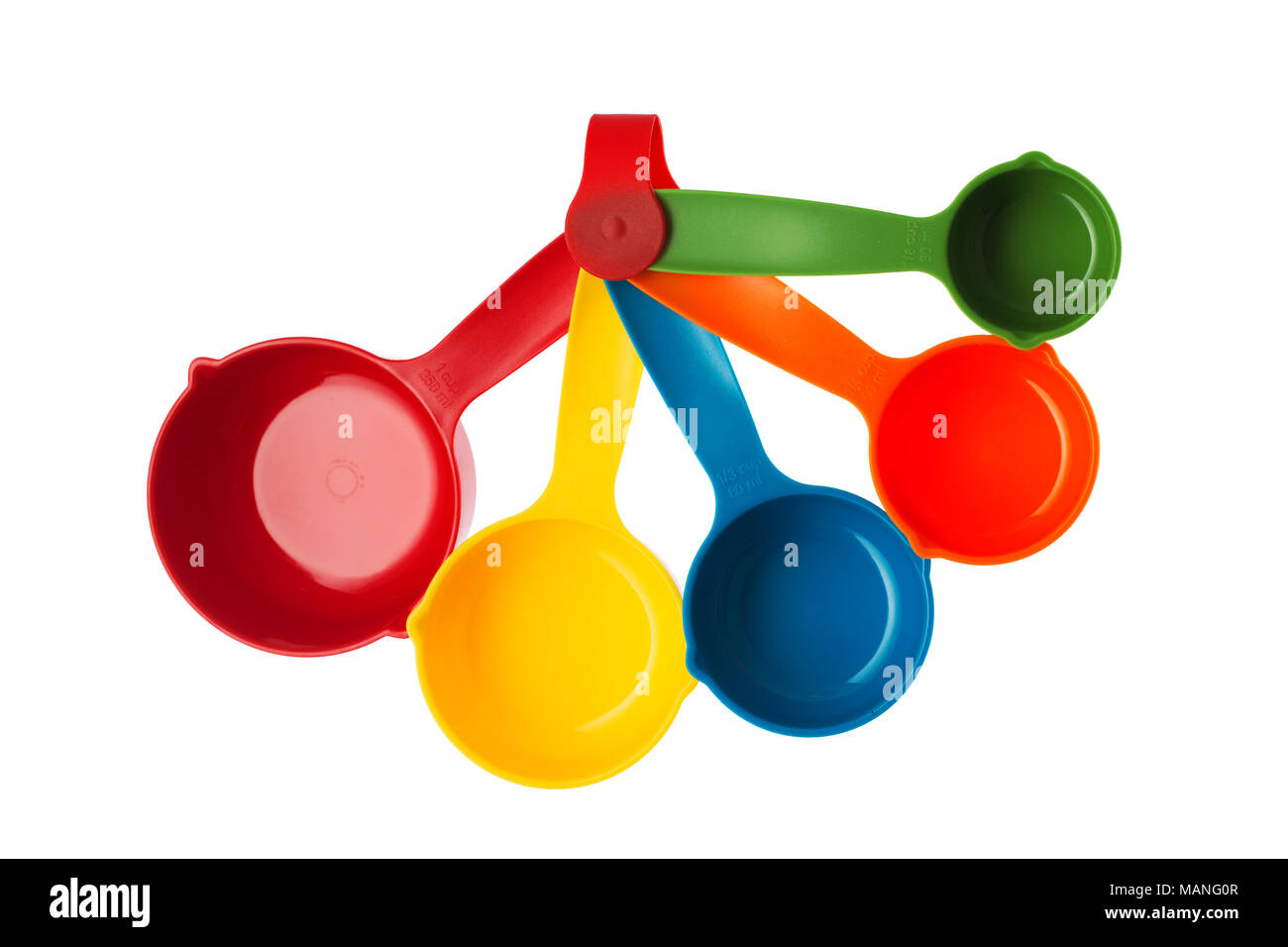 Color plastic dosing spoons isolated on a white background Stock Photo