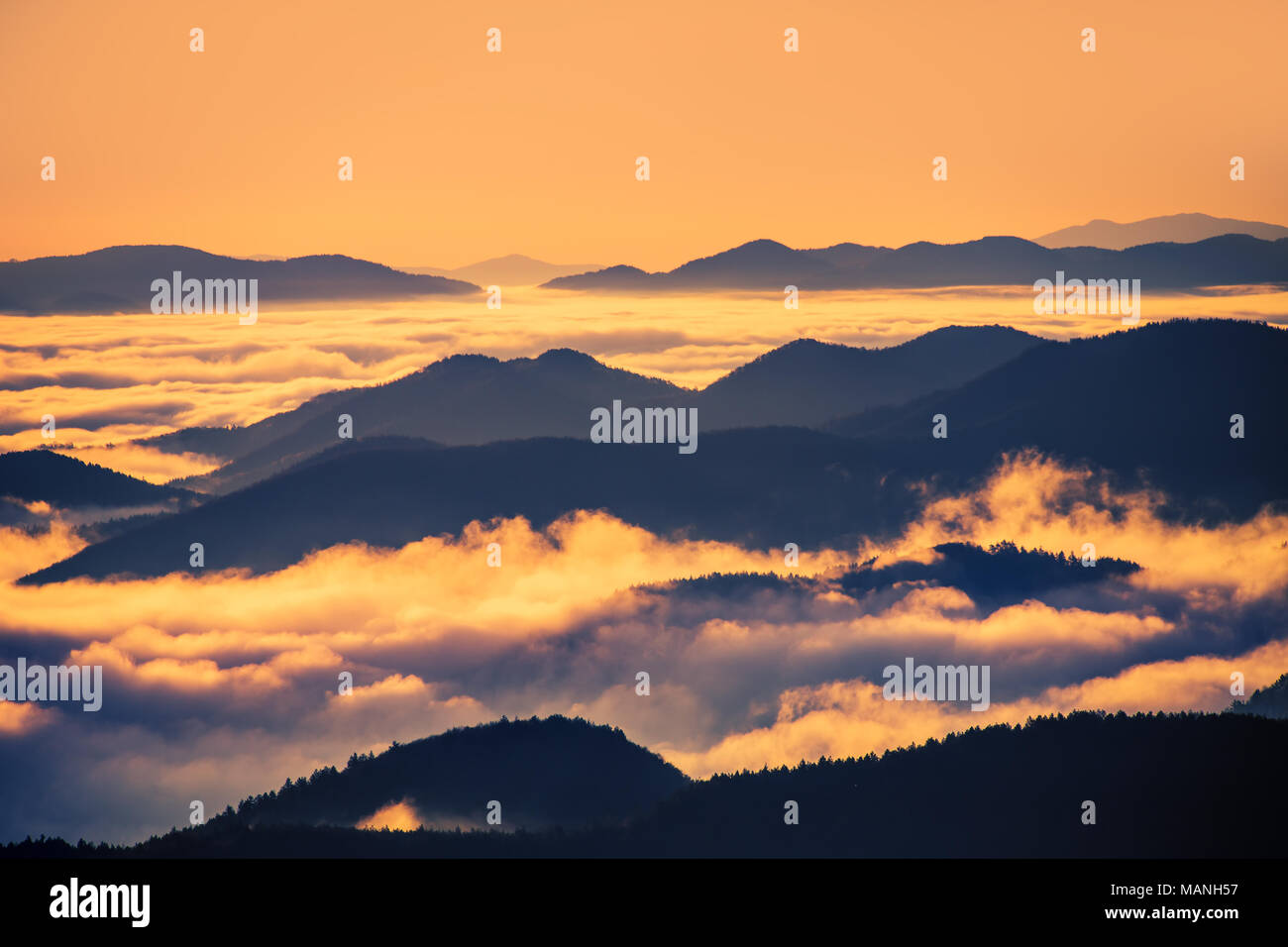 Sunrise in mountains background hi-res stock photography and images - Alamy