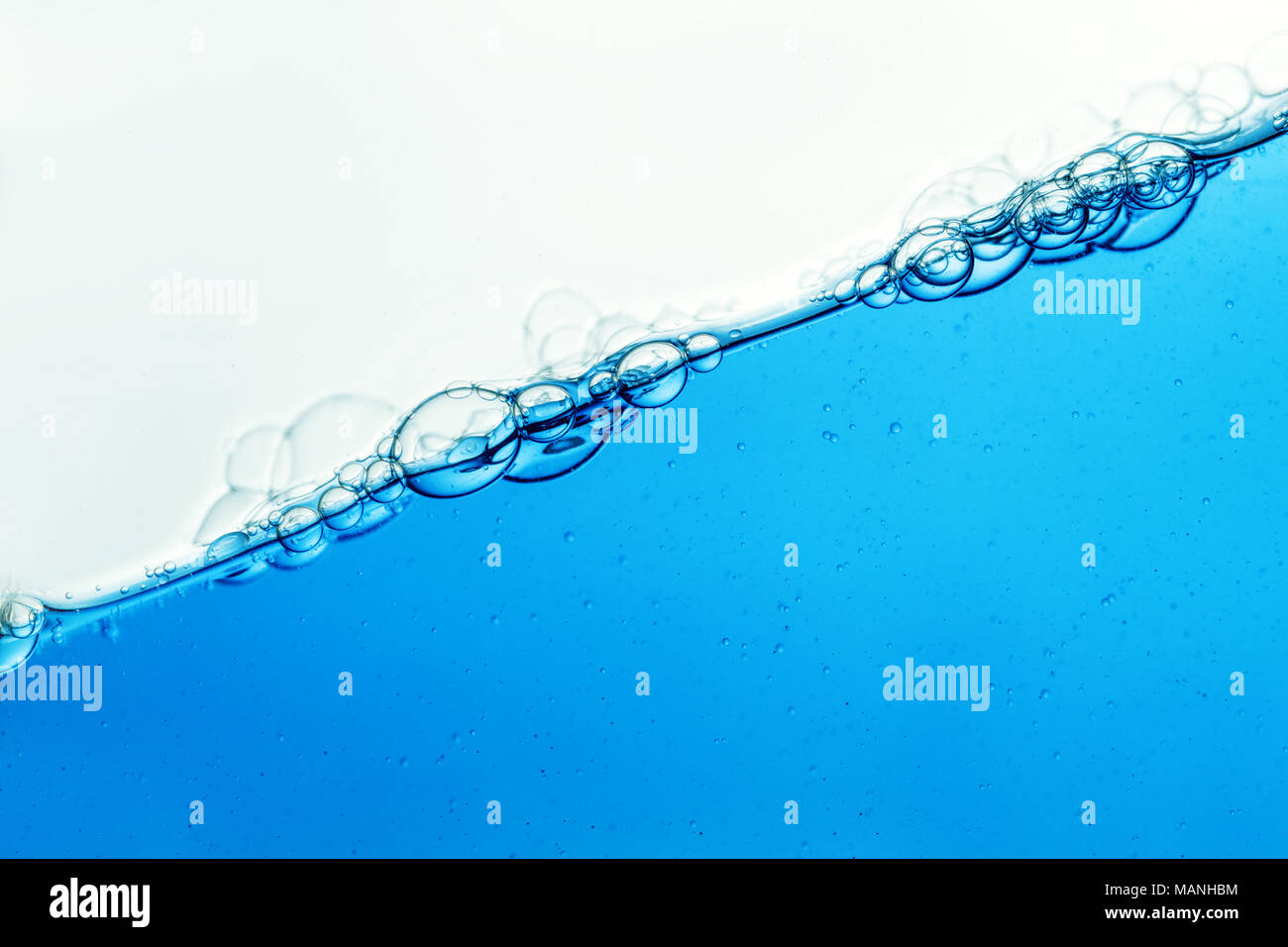 Water and air bubbles over white background Stock Photo