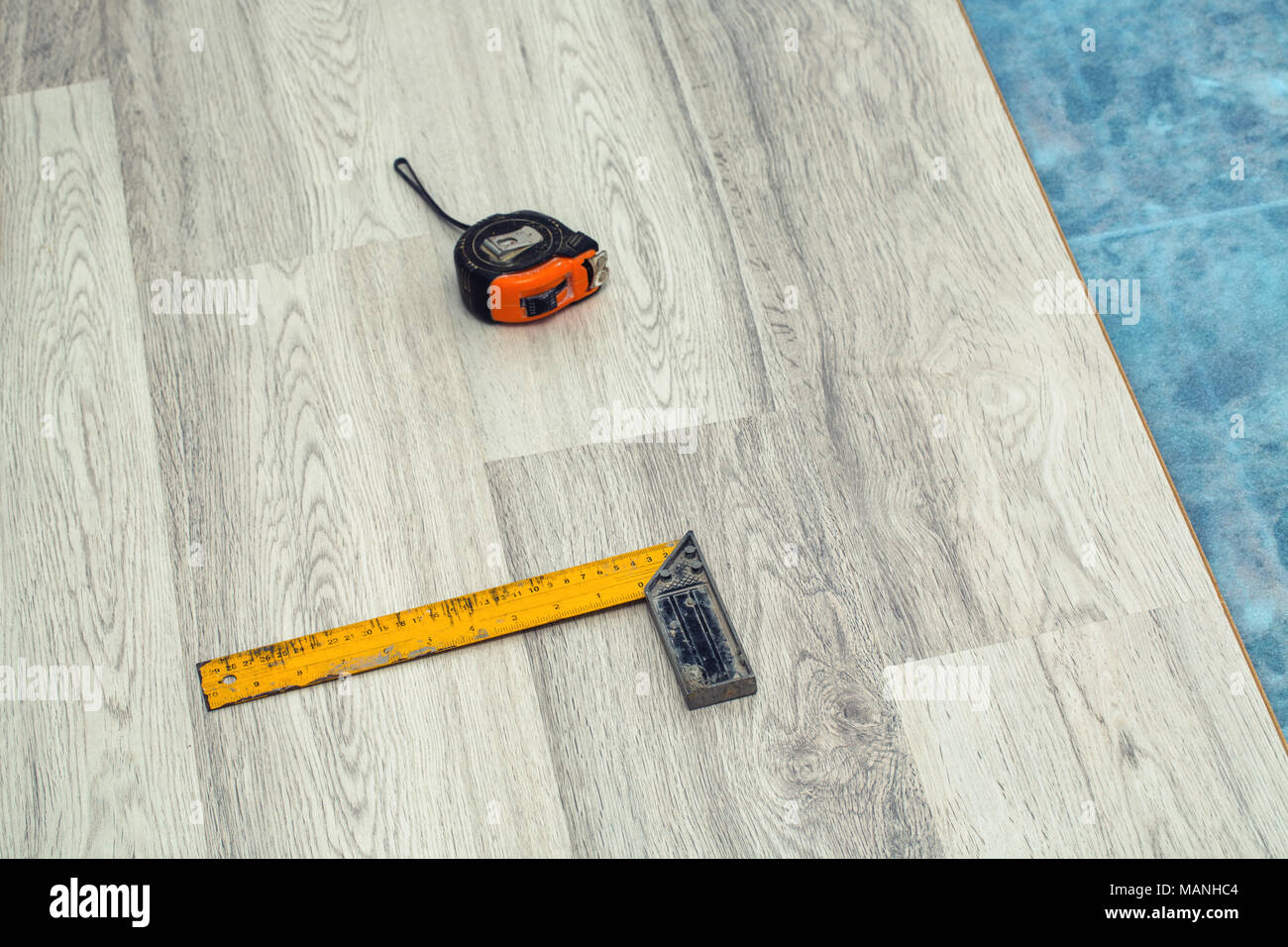 Floor panels, parquet, laminate, wood flooring and tools Stock Photo