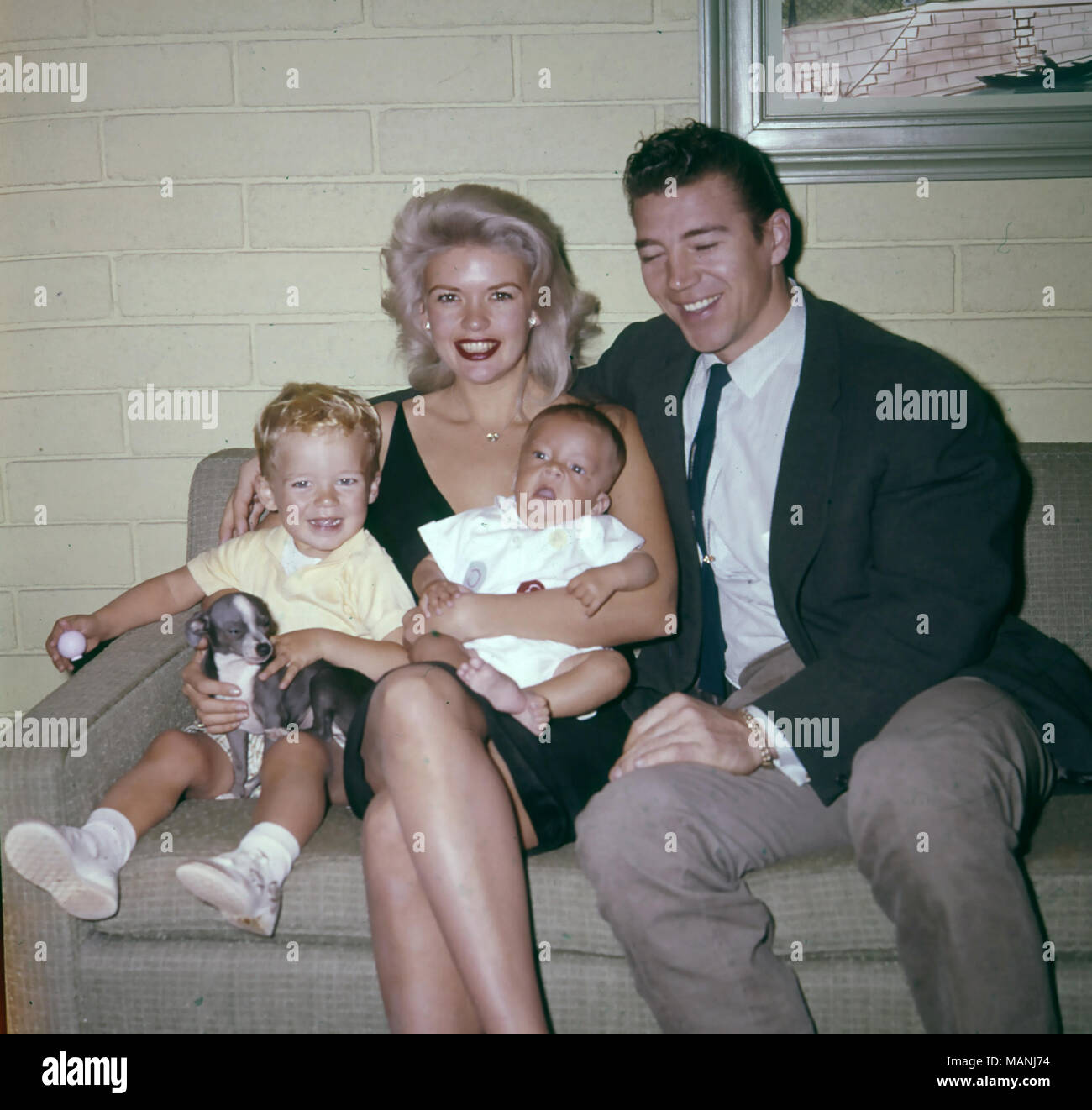 JAYNE MANSFIELD (1933-1967) American film actress with second husband Miklos Hargitay about 1962 with son Zoltan at left Stock Photo