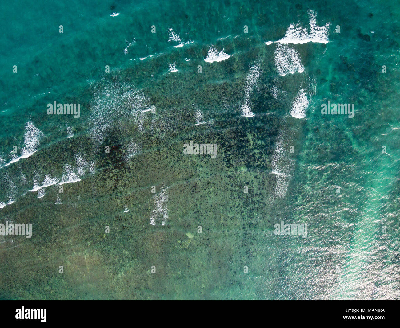 Dropshot of emerald tropical sea Stock Photo