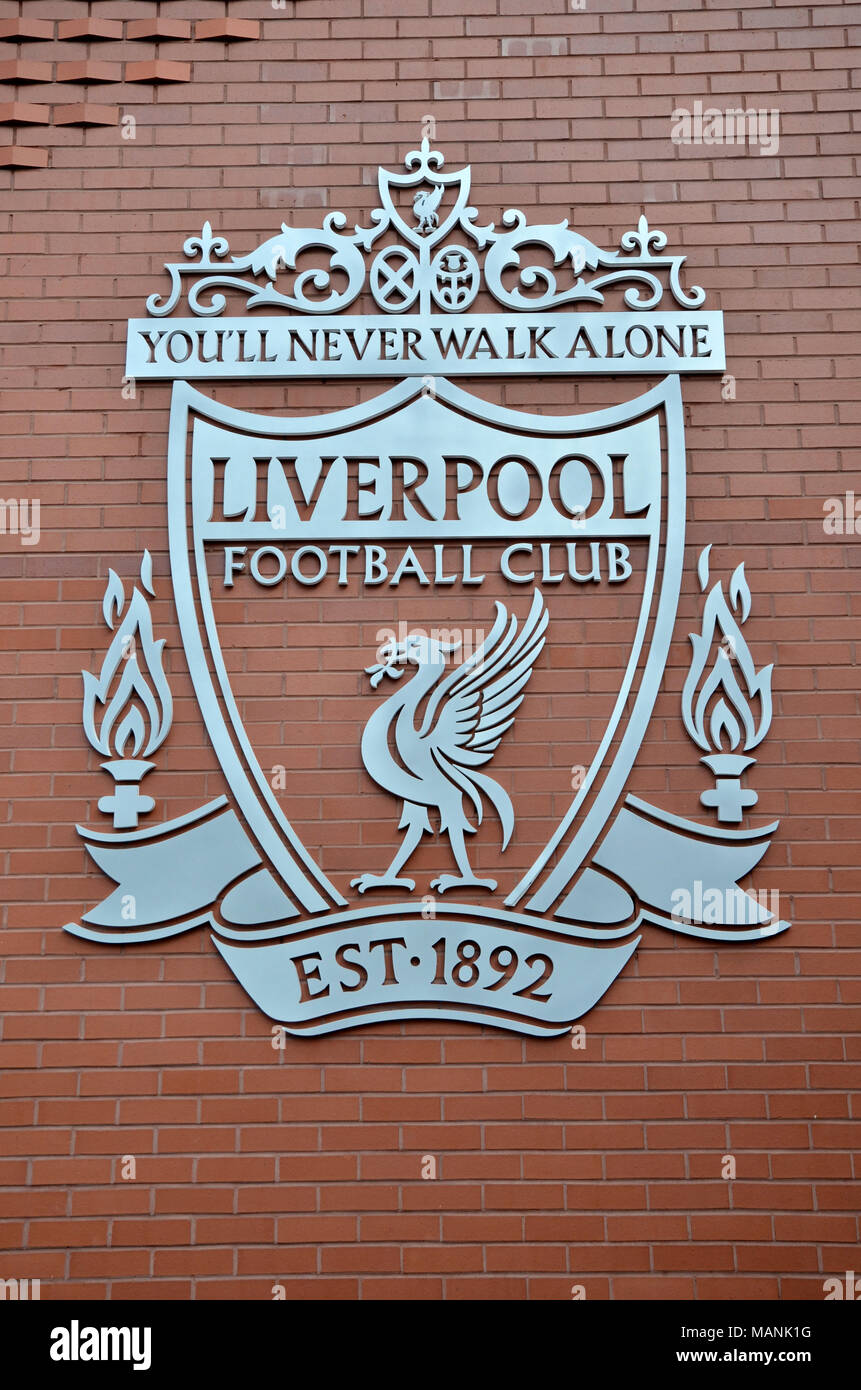 The Liverpool Football Club crest on the wall of the Kop end at Anfield Stadium Stock Photo