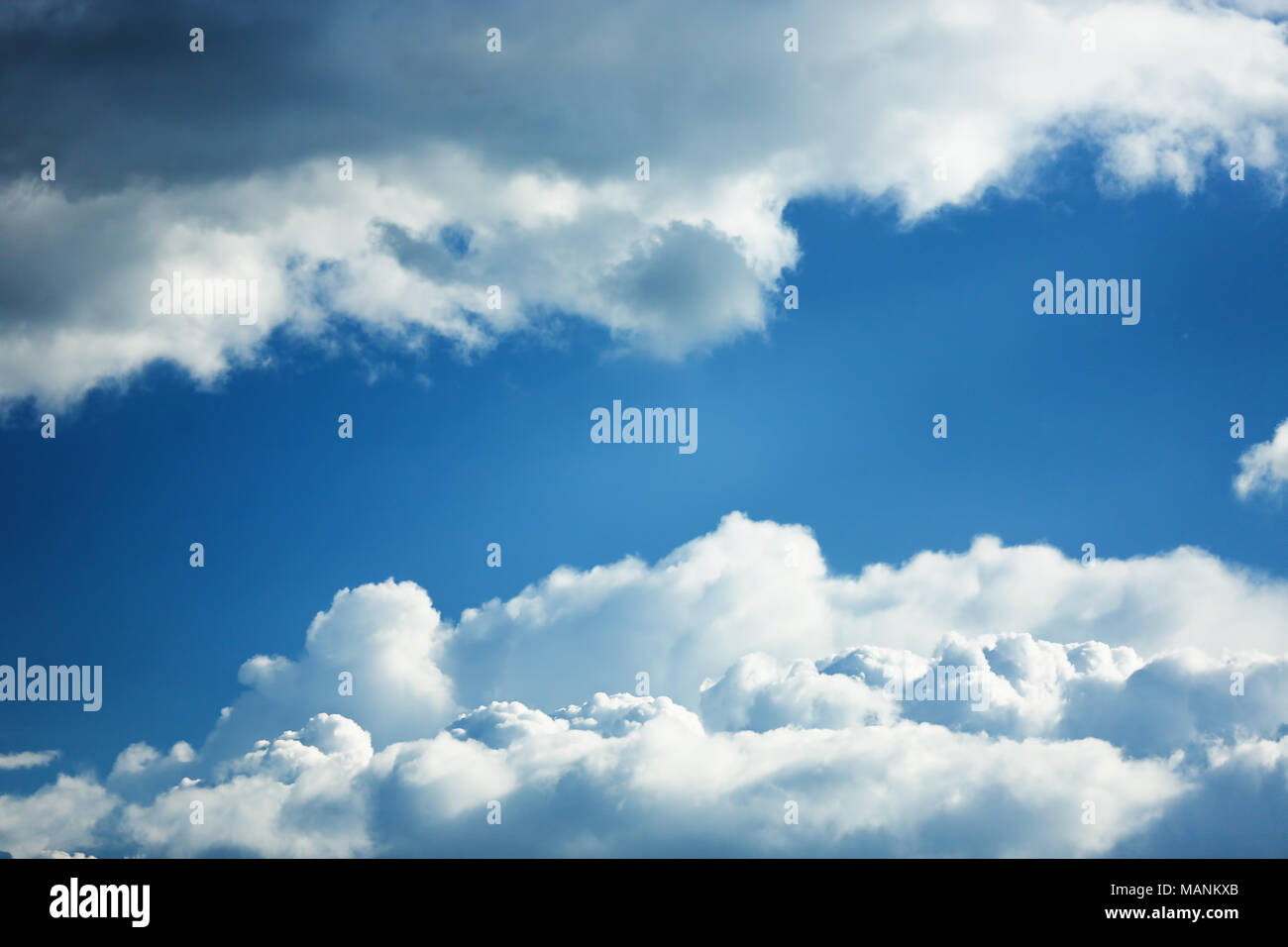 Blue sky background with white clouds Stock Photo - Alamy