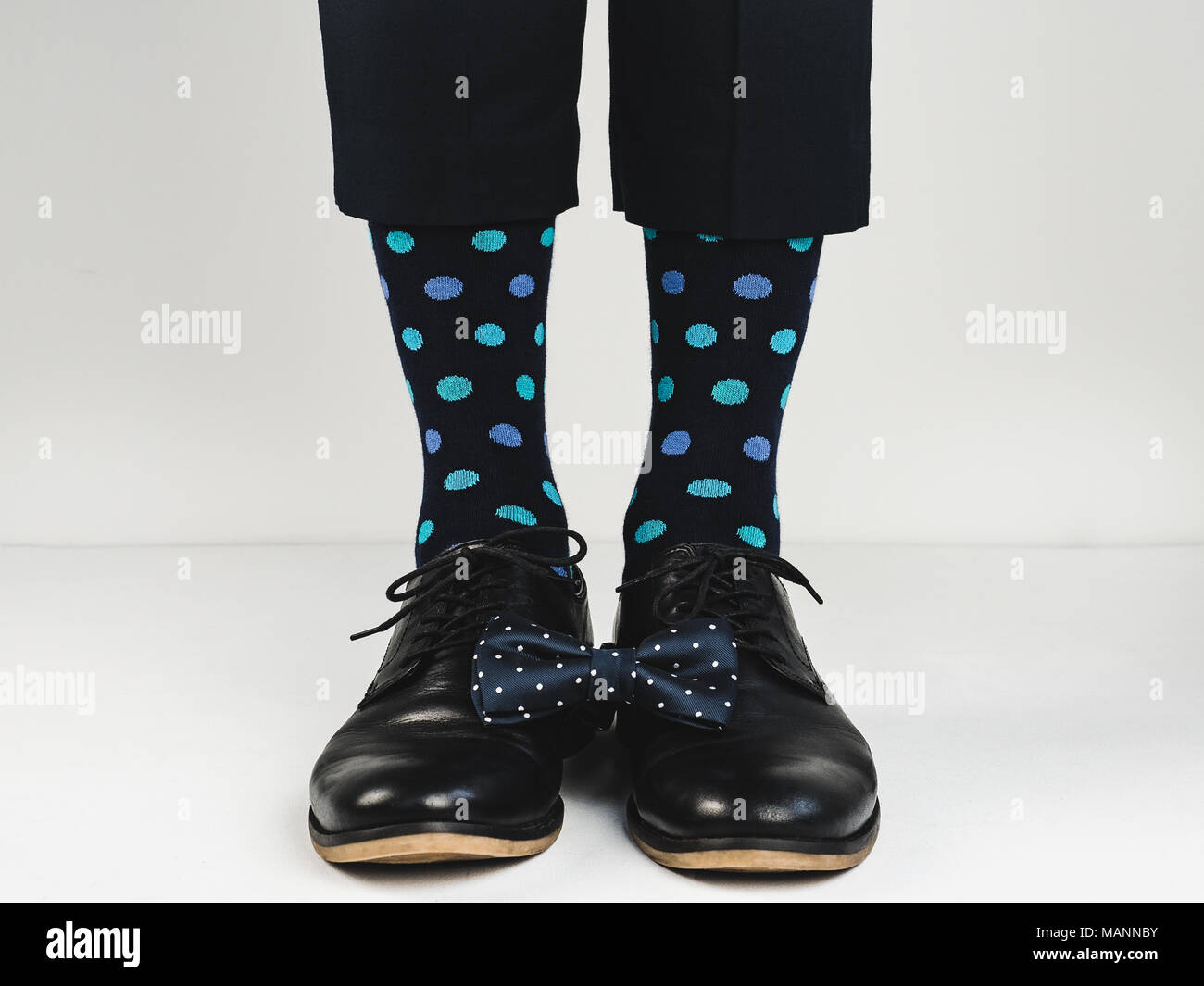 Stylish shoes, bright socks and bow tie Stock Photo - Alamy