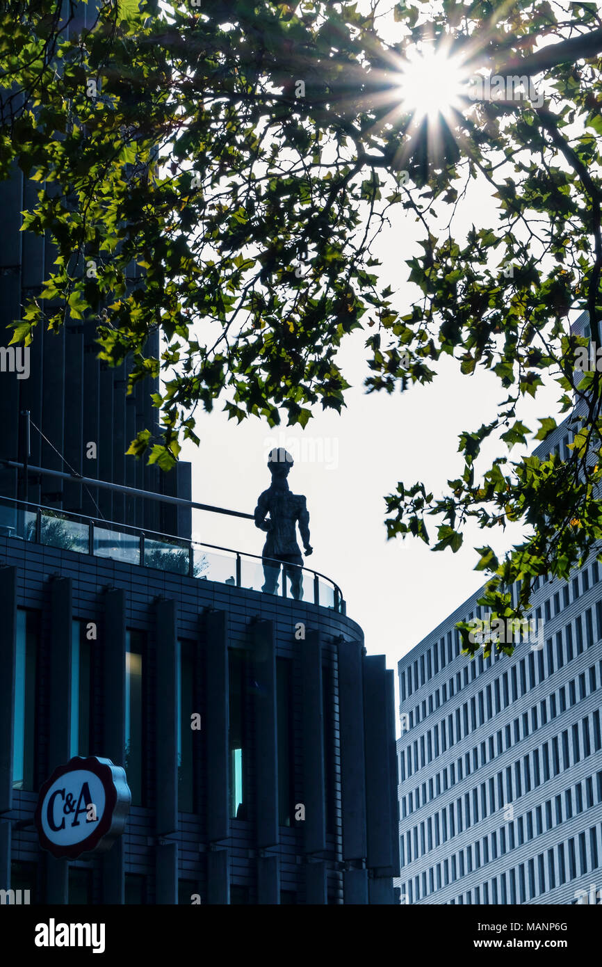 Berlin Charlottenburg,Swissôtel Luxury 5-star hotel overlooks Kurfürstendamm with sculpture on restaurant terrace & C&A retail store logo.             Stock Photo