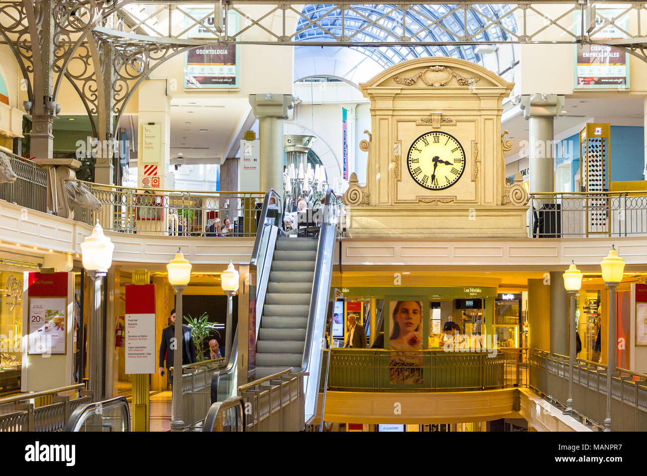 Buenos Aires, Argentina - March 21th, 2018: Interior of the Patio Bullrich shopping mall with the auction house clock in the background at Posadas str Stock Photo