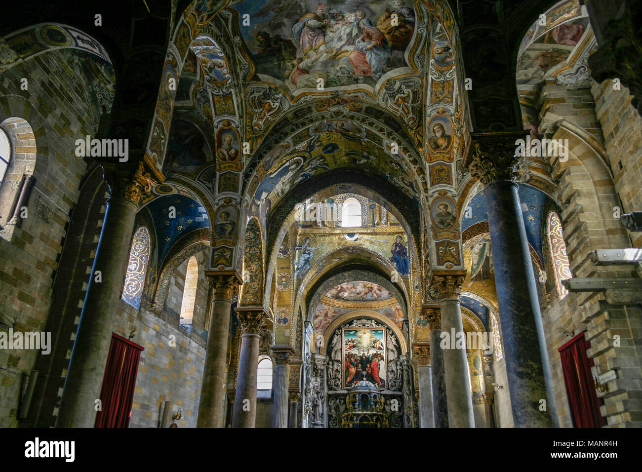 The Golden Mosaics of Monreale Cathedral in Palermo, Sicily, Italy. The Byzantine mosaics were made with approximately Stock Photo