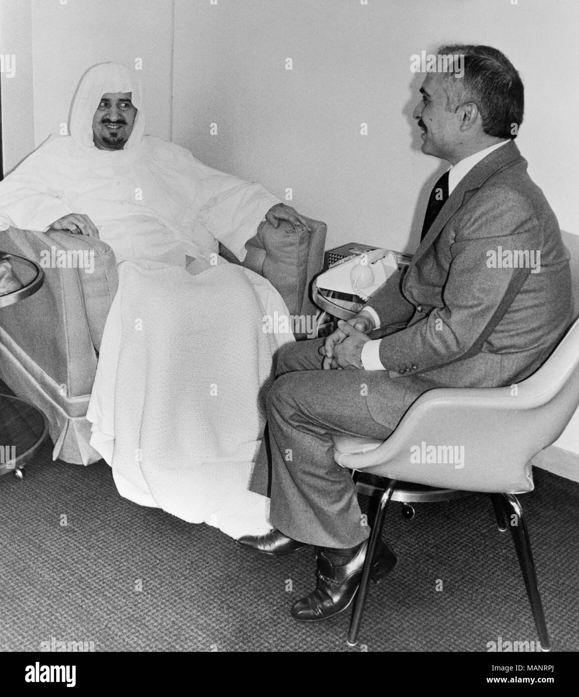 24th February 1977. London. King Hussein of Jordan visits King Khaled of Saudi Arabia at the London Hospital where the King is recovering from a hip operation. the 64 year old Saudi Arabian King received Hussein in his suite at the Wellington Hospital in St. John's Wood. Stock Photo