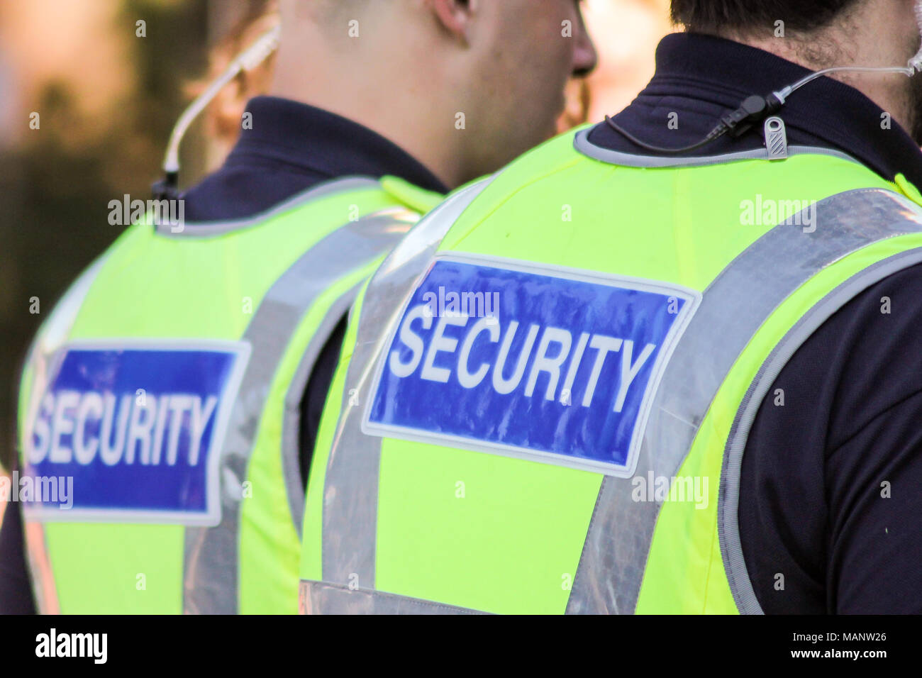 Two male security guards on patrol Stock Photo