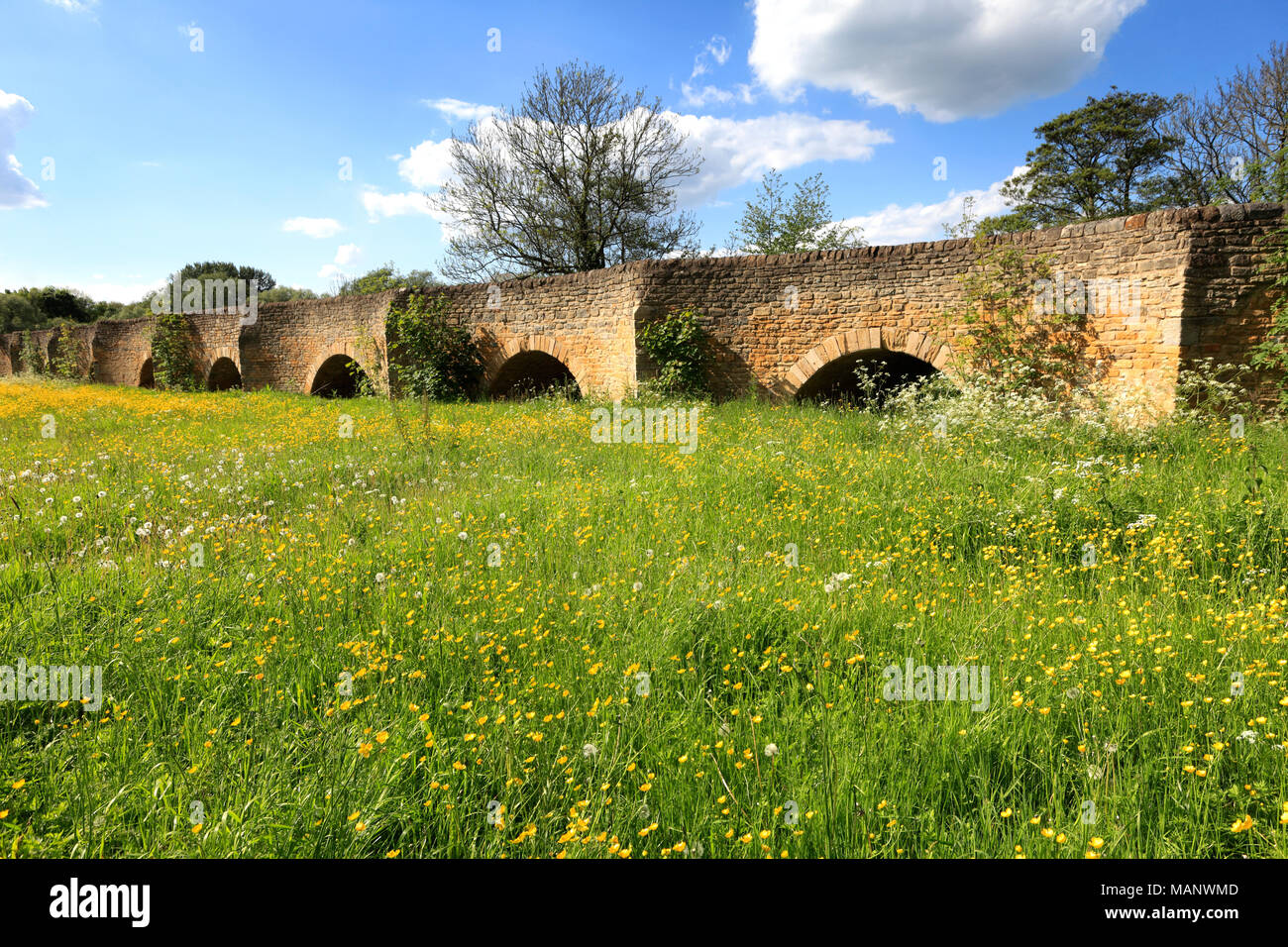 Summer view of part of the 26 arched stone bridge spanning river Great