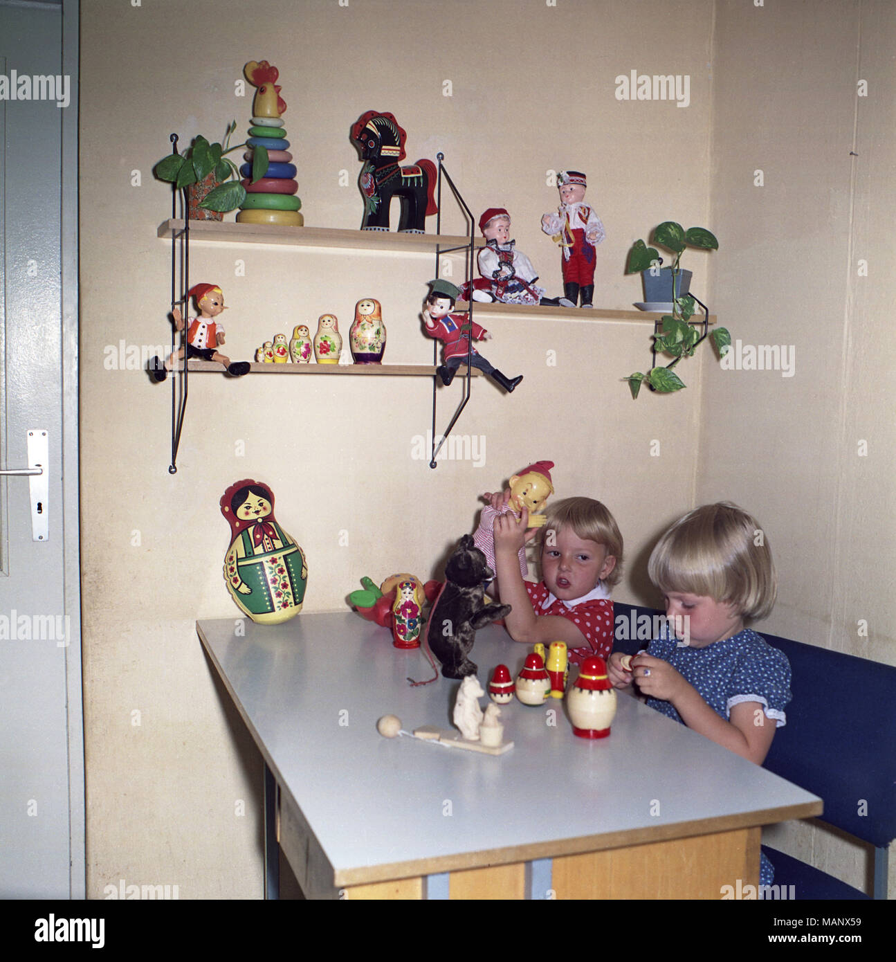 Eisenach, GDR, Kindergarten children playing at a table Stock Photo - Alamy