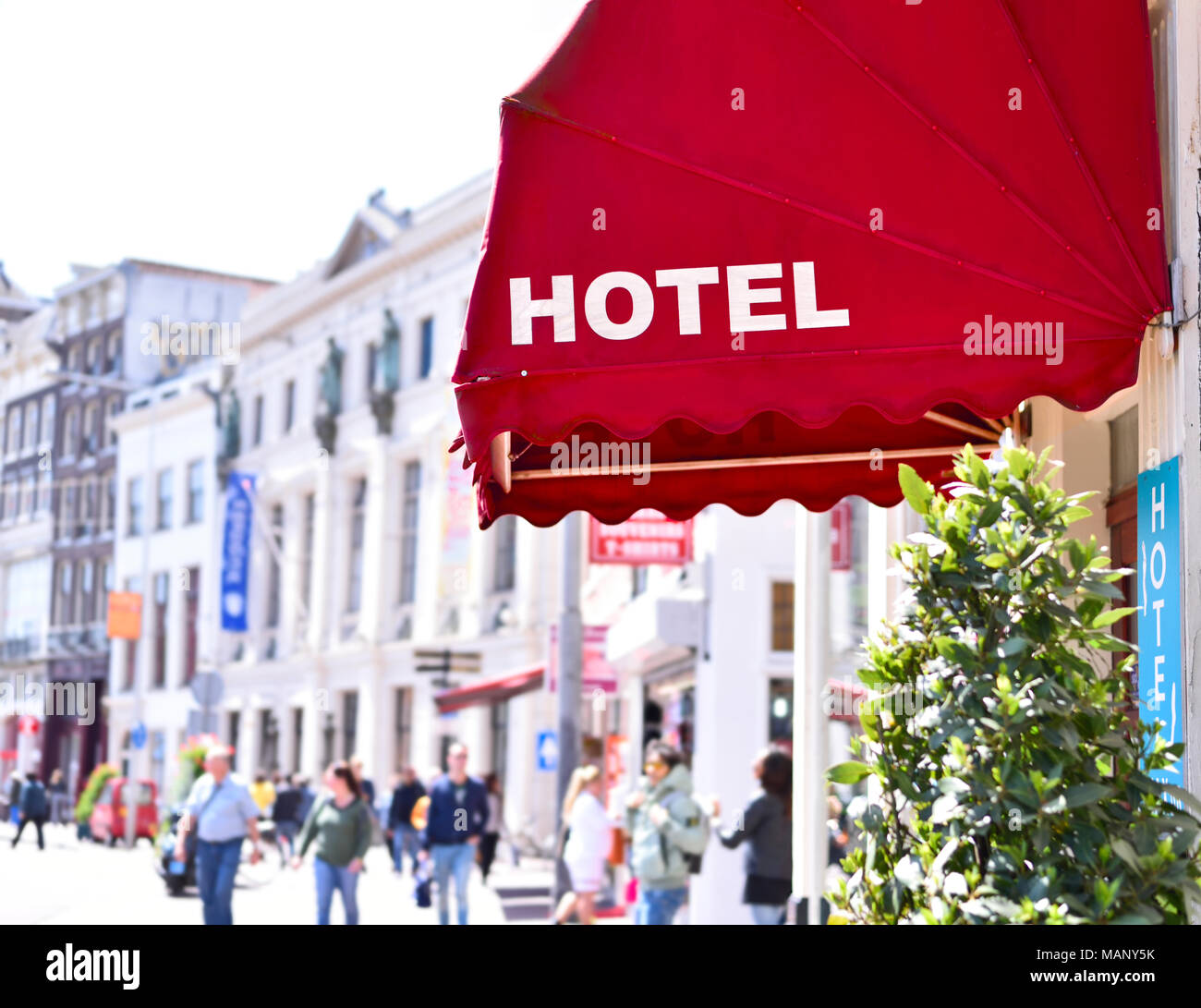 Old, elegant hotel entrance with marquise. City or town hotel, elegant entrance. Stock Photo