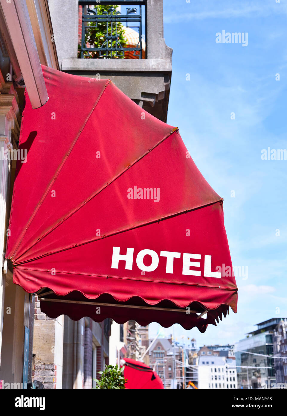 Old, elegant hotel entrance with marquise. City or town hotel, elegant entrance. Stock Photo