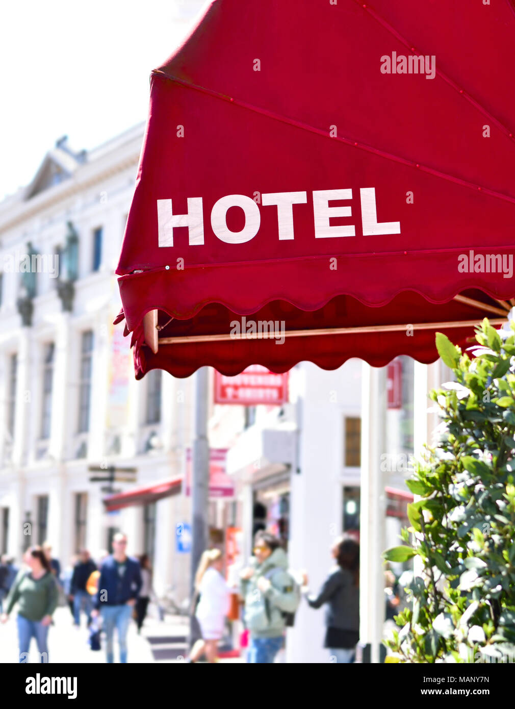 Old, elegant hotel entrance with marquise. City or town hotel, elegant entrance. Stock Photo