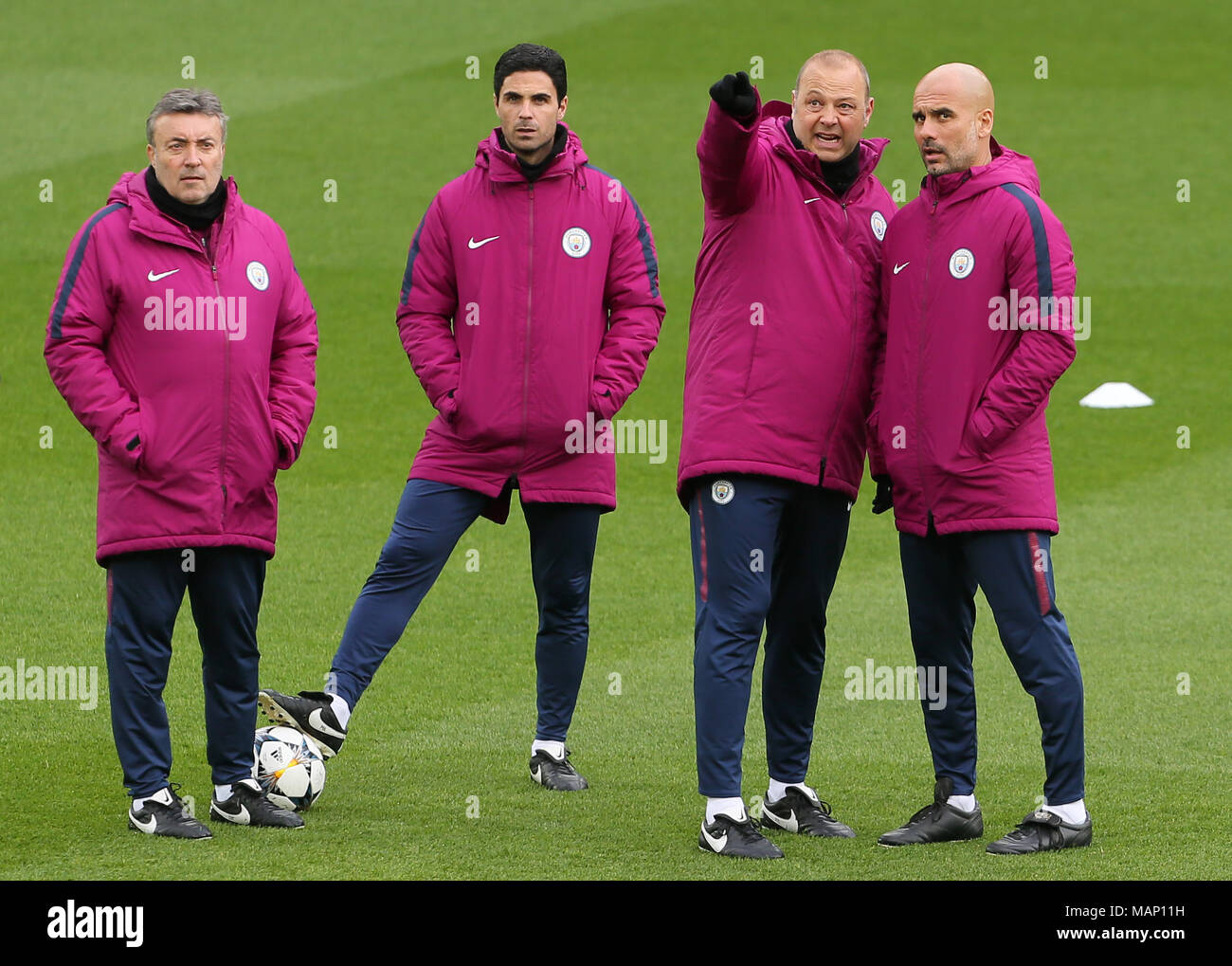 Manchester City manager Pep Guardiola (right) with his coaching staff  during the training session at Anfield, Liverpool Stock Photo - Alamy