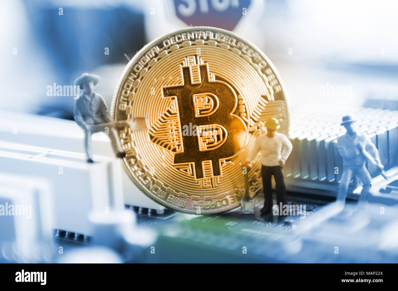 Marco shot of bitcoin and minner worker man , figures working on group of  bitcoins. virtual cryptocurrency mining concept Stock Photo - Alamy