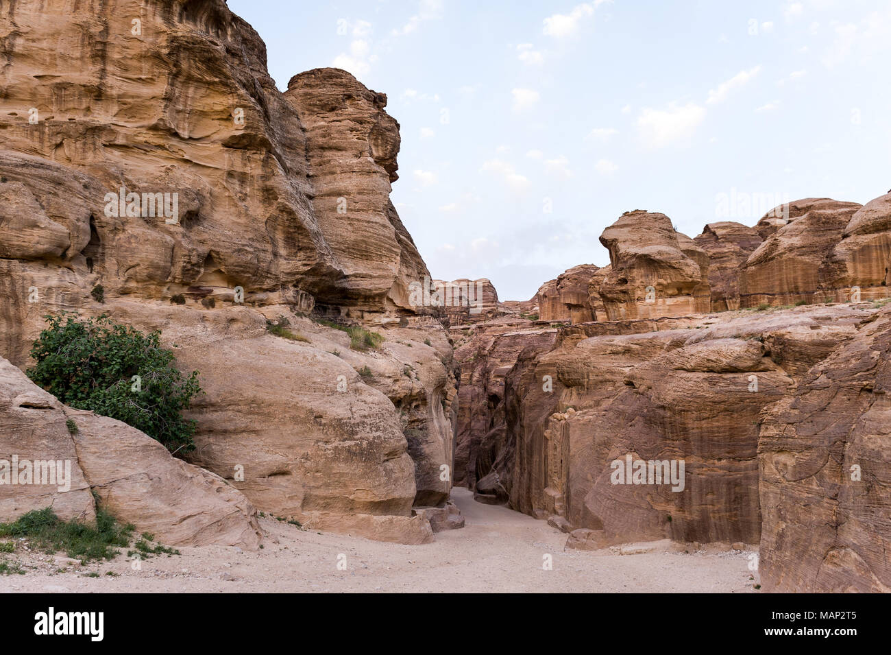 Petra is a historical and archaeological city in the southern Jordanian governorate of Ma'an that is famous for its rock-cut architecture. Stock Photo
