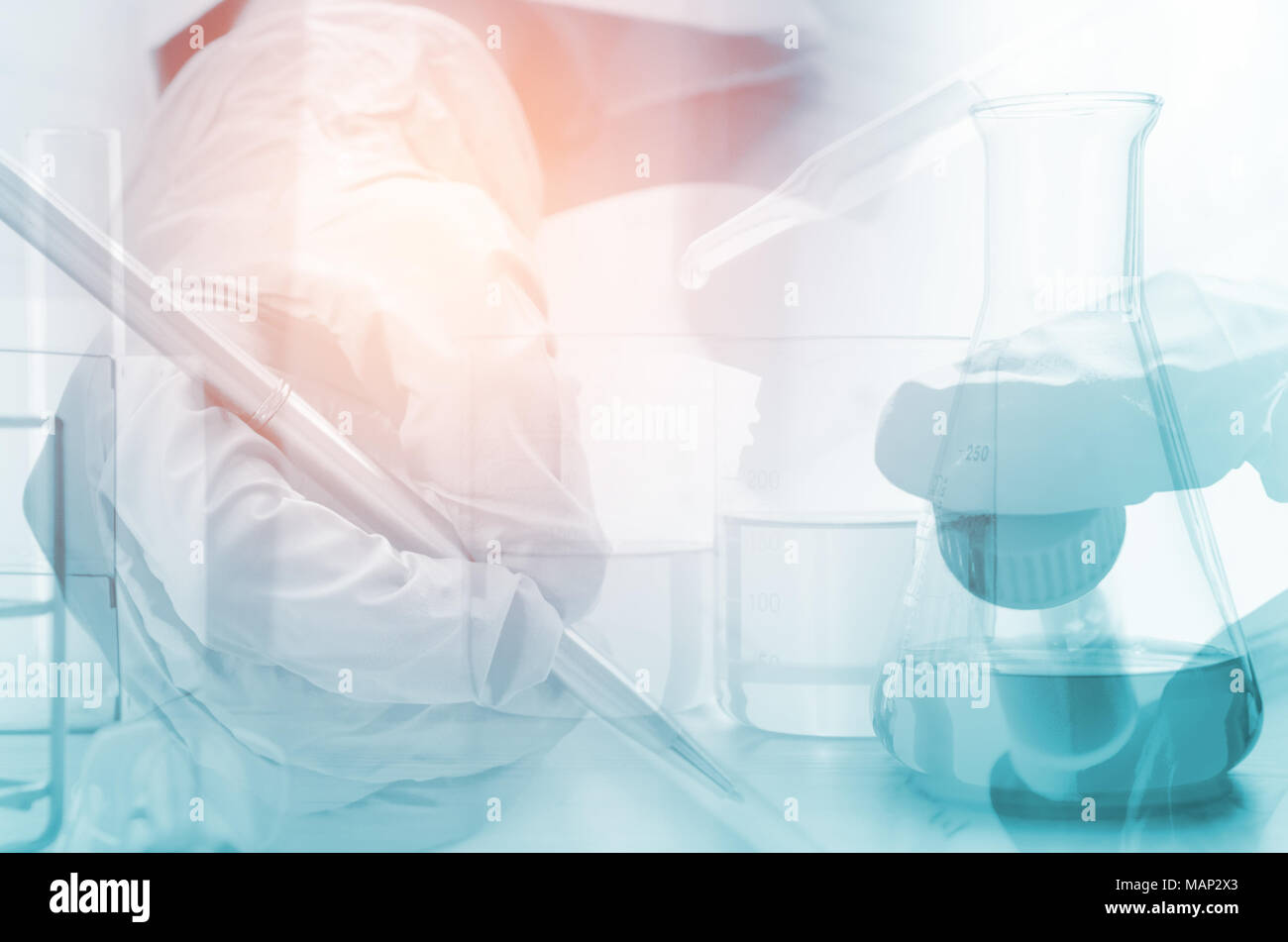 three erlenmeyer flask and microscope , Glassware on  science laboratory research and development Stock Photo