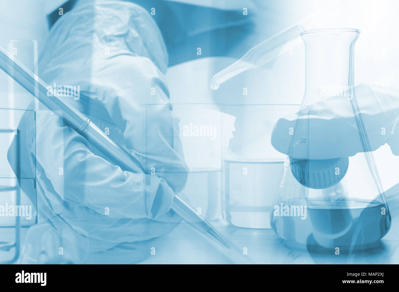 three erlenmeyer flask and microscope , Glassware on  science laboratory research and development Stock Photo