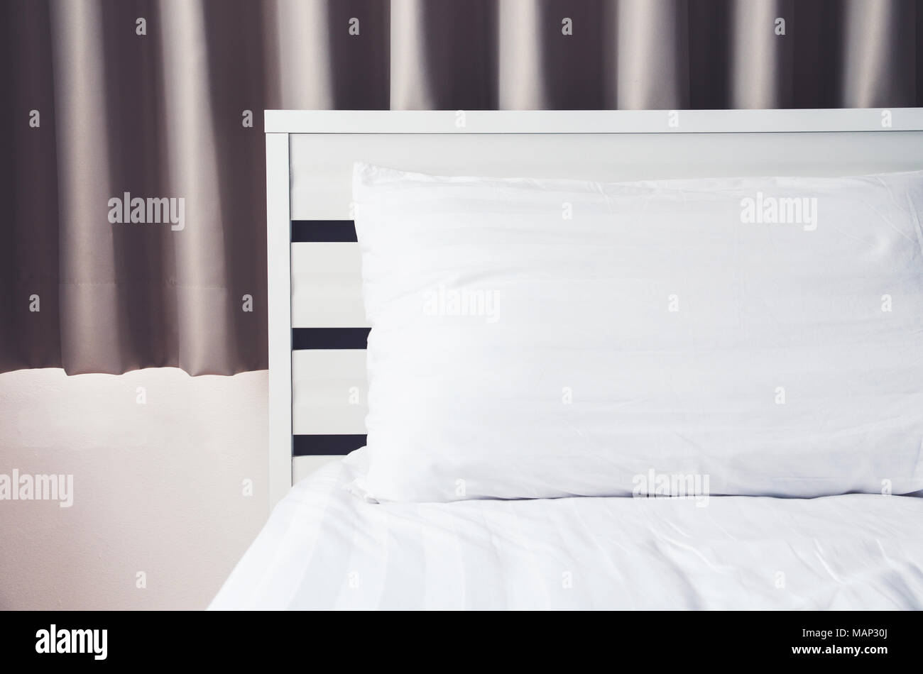 quilt bed white pillows on white bed in bedroom Stock Photo Alamy