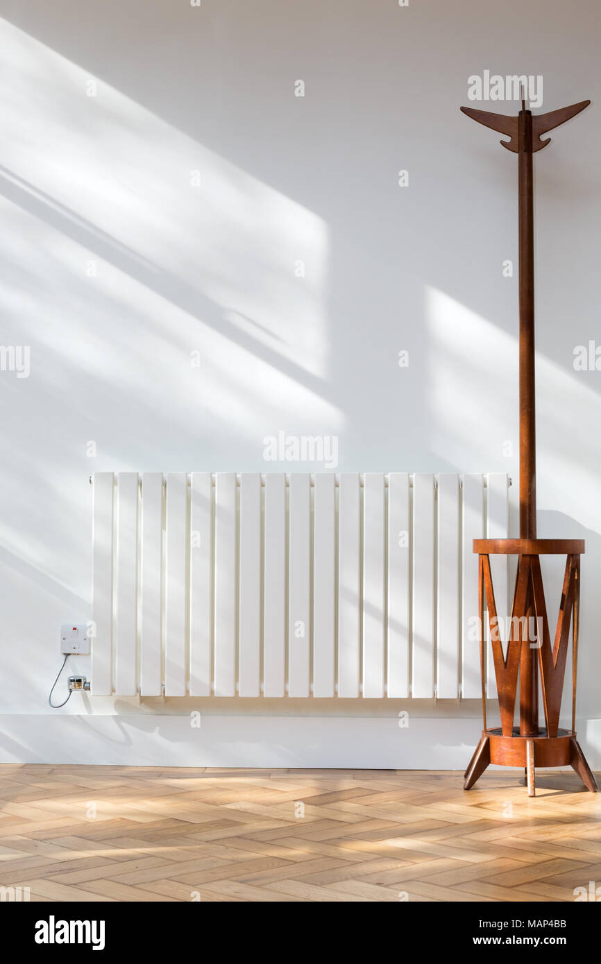 Coatstand with coat hires stock photography and images Alamy