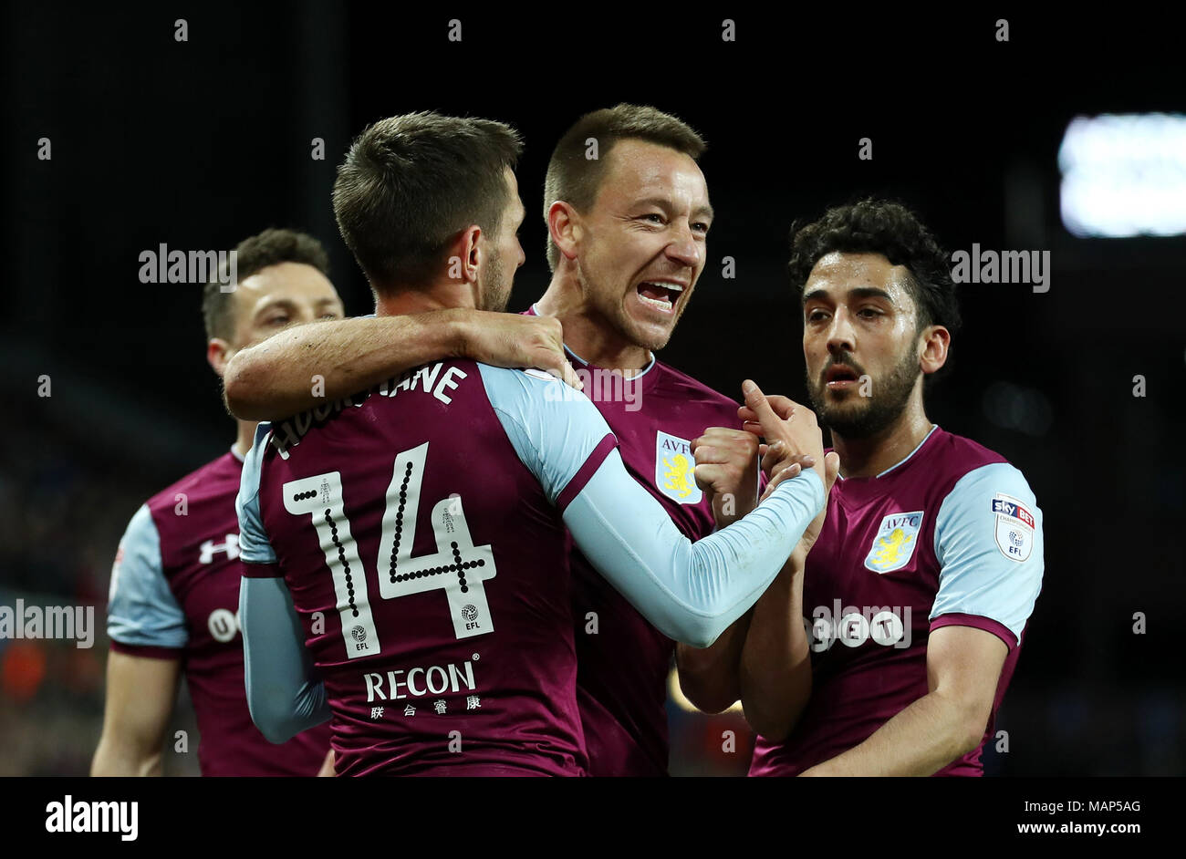 Aston Villa's Conor Hourihane (left) celebrates scoring his side's second goal of the game with teammate John Terry during the Sky Bet Championship match at Villa Park, Birmingham. Stock Photo