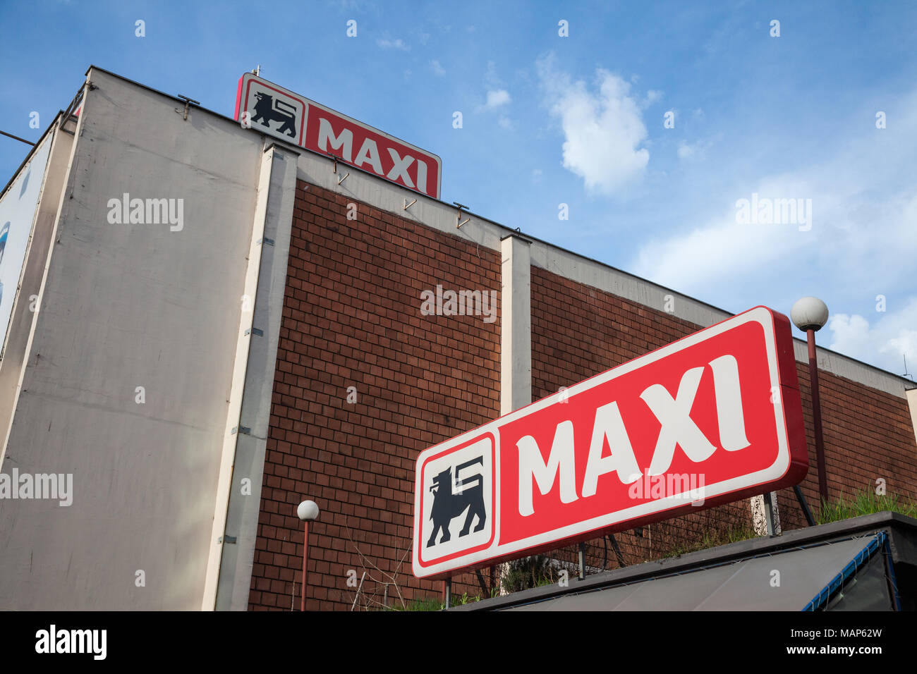 BELGRADE, SERBIA - MARCH 30, 2018: Entrance of a Maxi Supermarket with its logo. Belonging to the Belgian group Delhaize, Maxi Supermarkets is the lea Stock Photo
