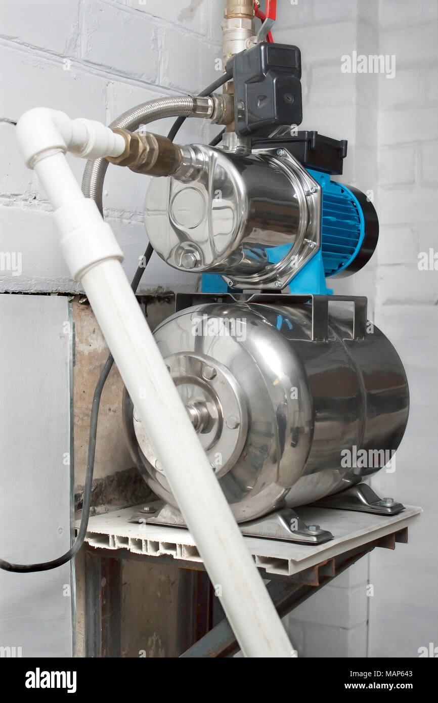 Automatic water pump in the basement Stock Photo Alamy