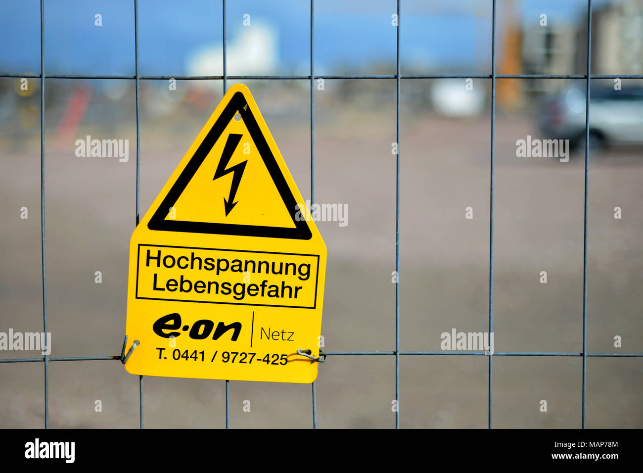 Oldenburg, Germany, warning sign against danger of life due to high voltage Stock Photo