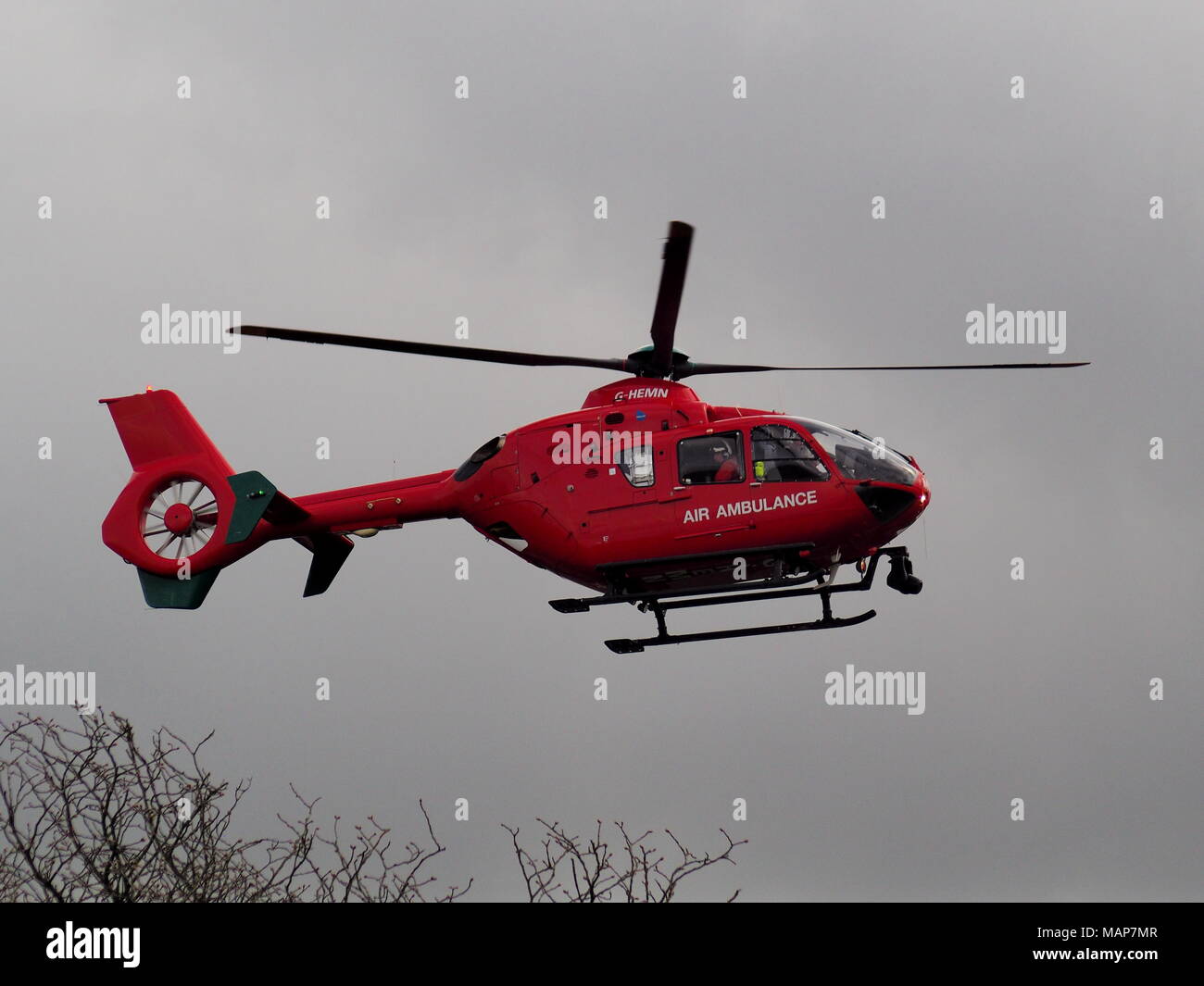 Aldermaston Wharf, Berkshire, UK, April 3 2018: Air Ambulance landing to attend to an emergency Stock Photo