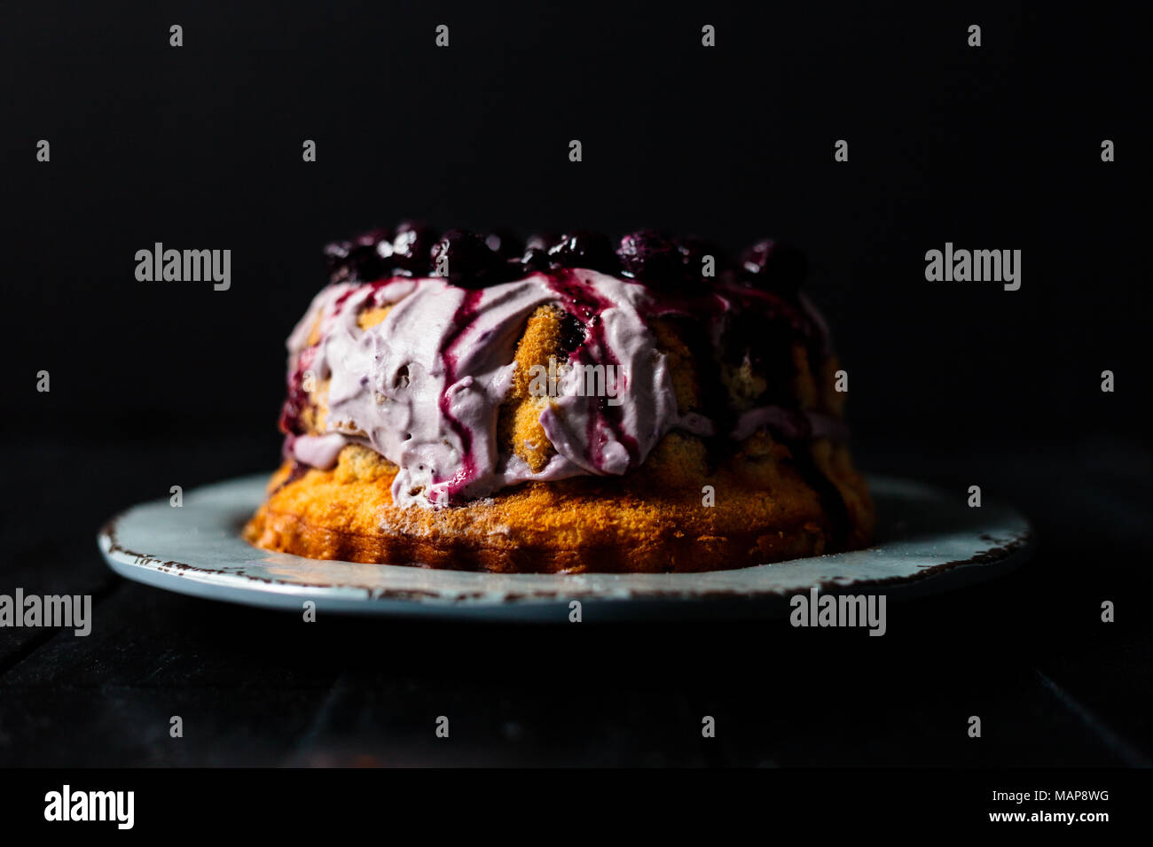 Blueberry Cake with whip cream Stock Photo - Alamy
