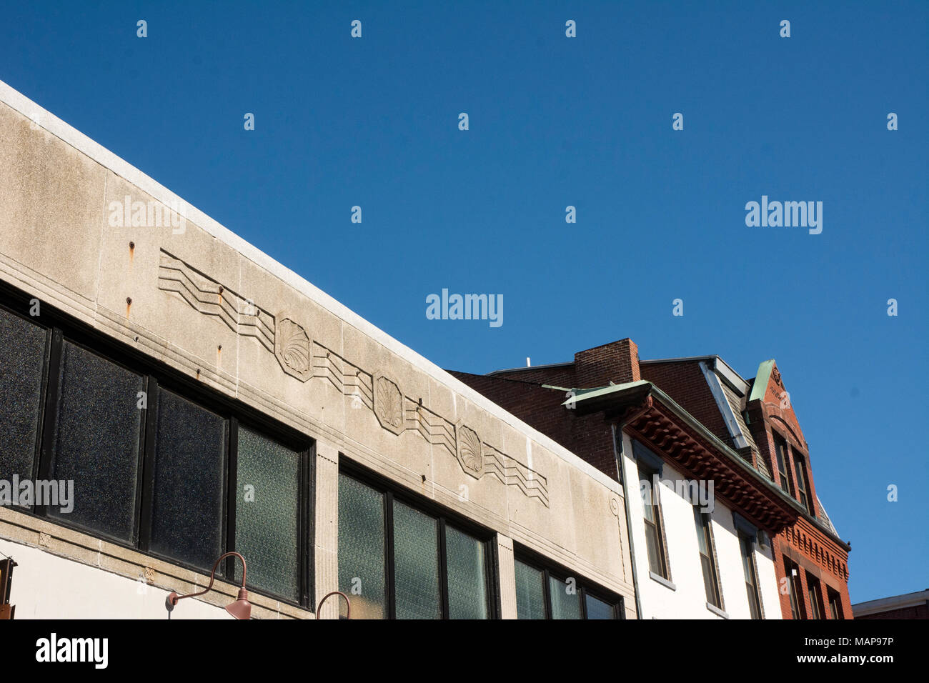 Inscription on top of building. Stock Photo