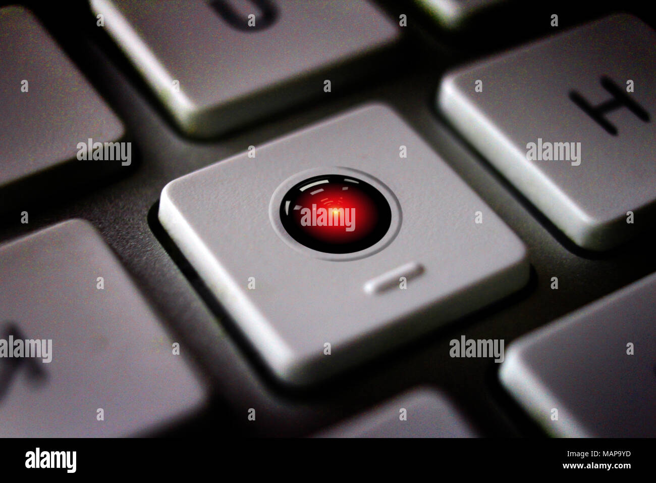 Image of HAL computer from Stanley Kubrick's 2001:A Space Odyssey (film) icon on computer keyboard Stock Photo