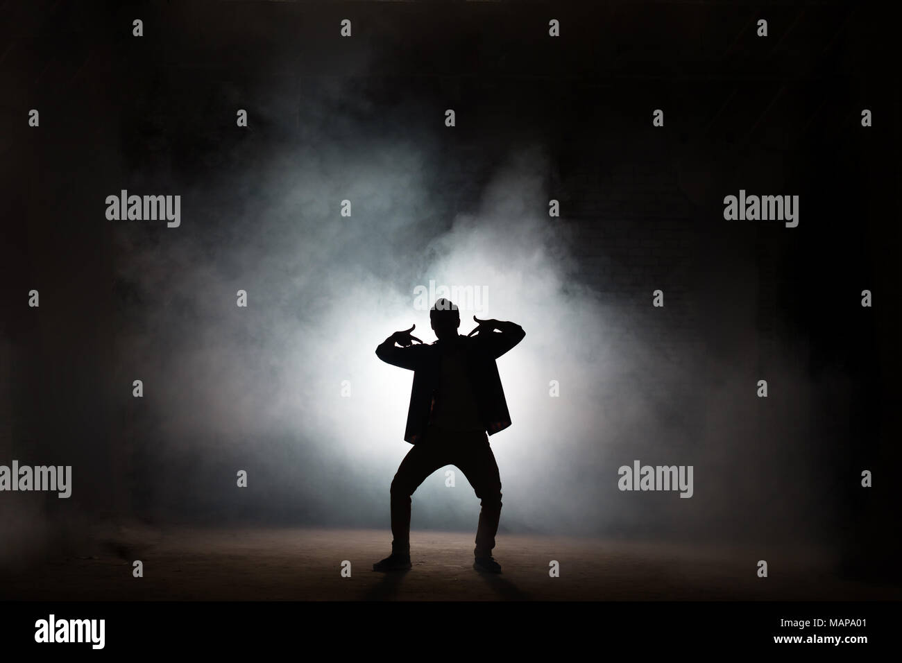 rapper dancing isolated on black background Stock Photo