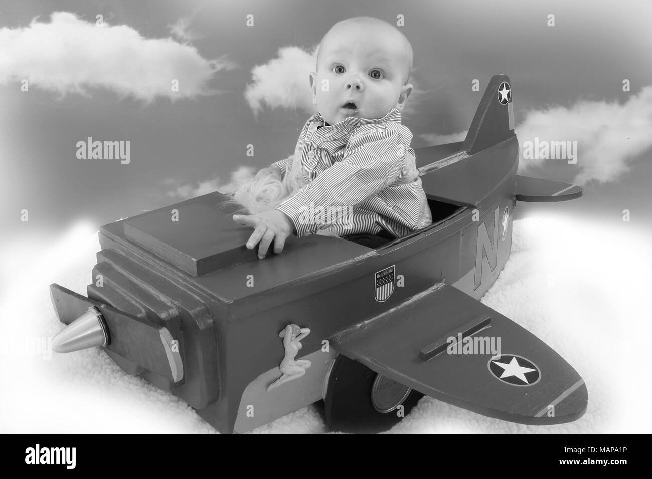 3 month old baby boy in an aeroplane Stock Photo Alamy