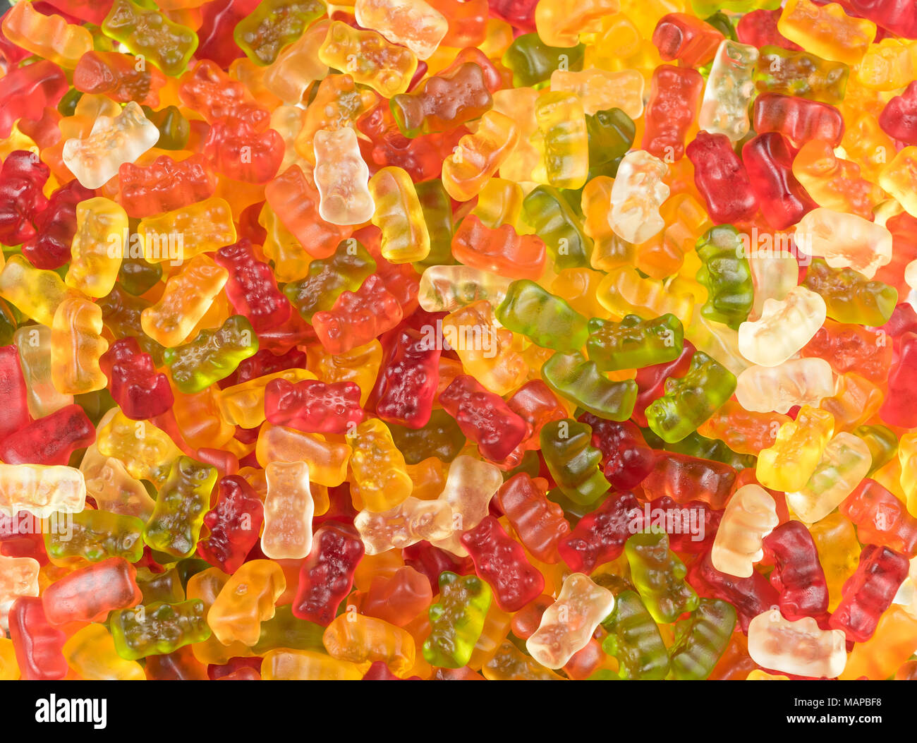 Brightly coloured gummy bear sweets / jelly babies in a candy sweet shop. Potential use as a background. Stock Photo