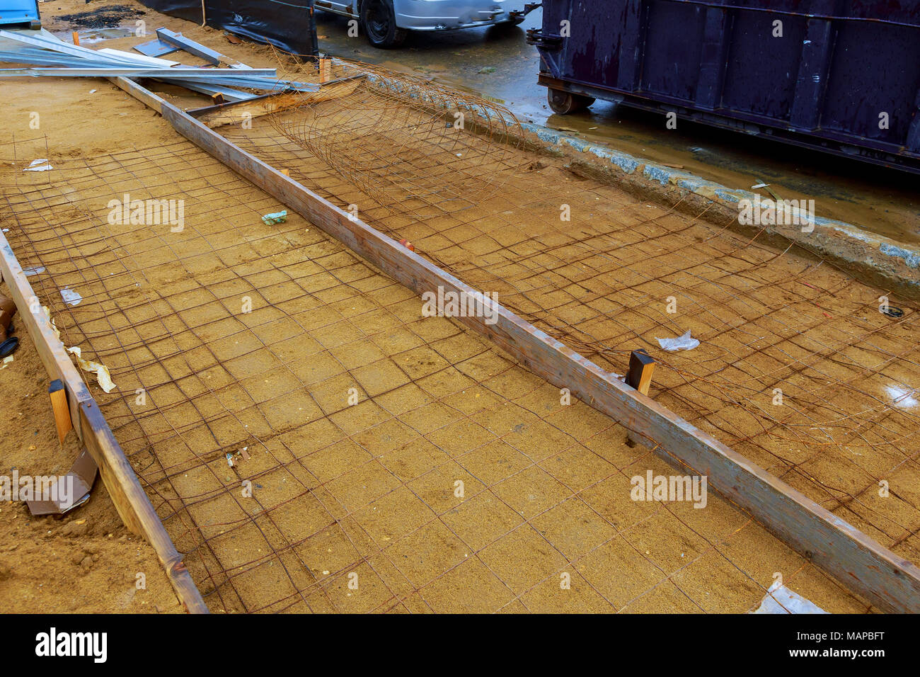 installation of formwork for sidewalk Road railing anchor plate and reinforcement Stock Photo