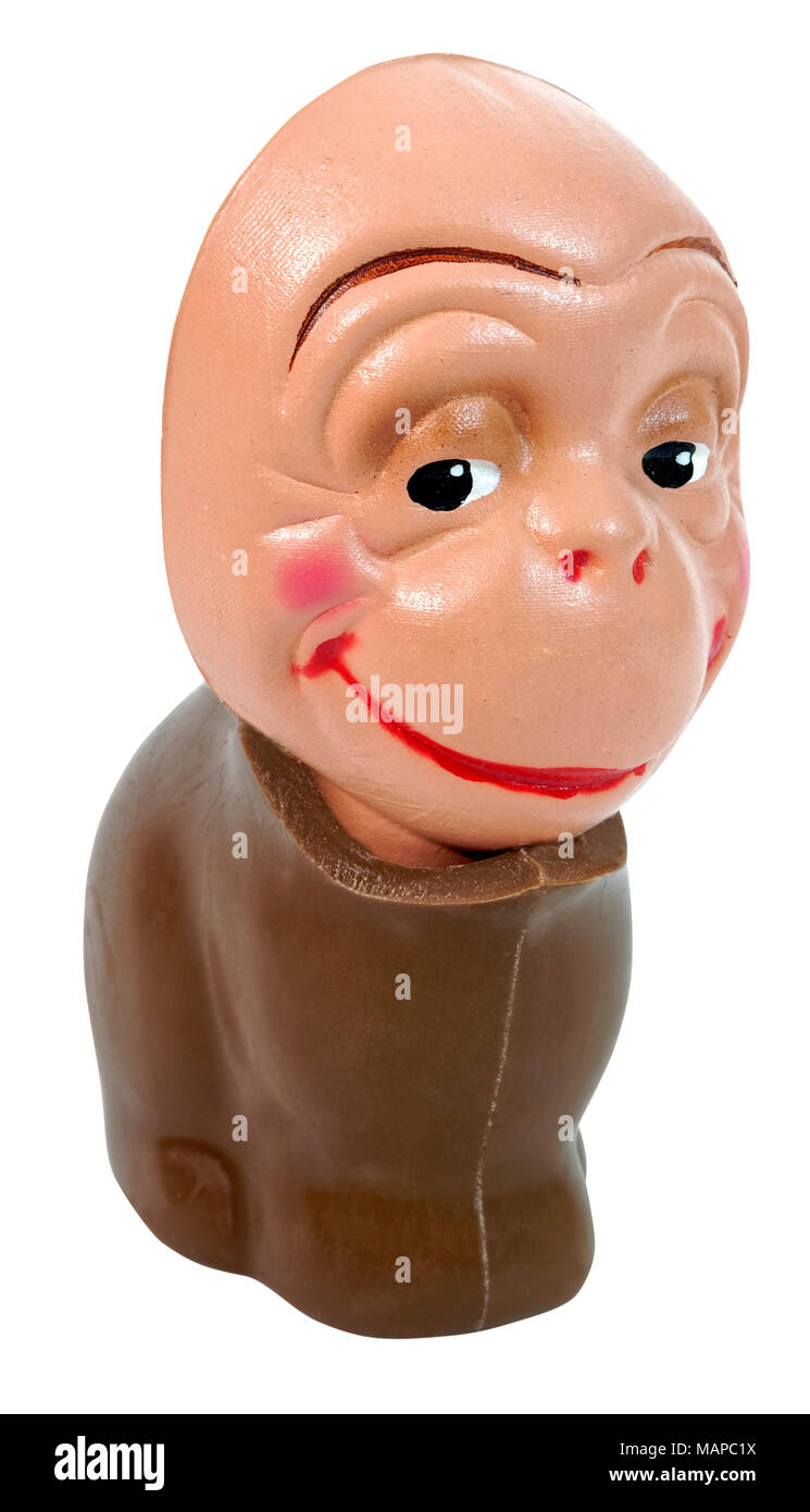 Chocolate bunny body with monkey doll head. Isolated. Fun Humor. Abstract. Stock Photo