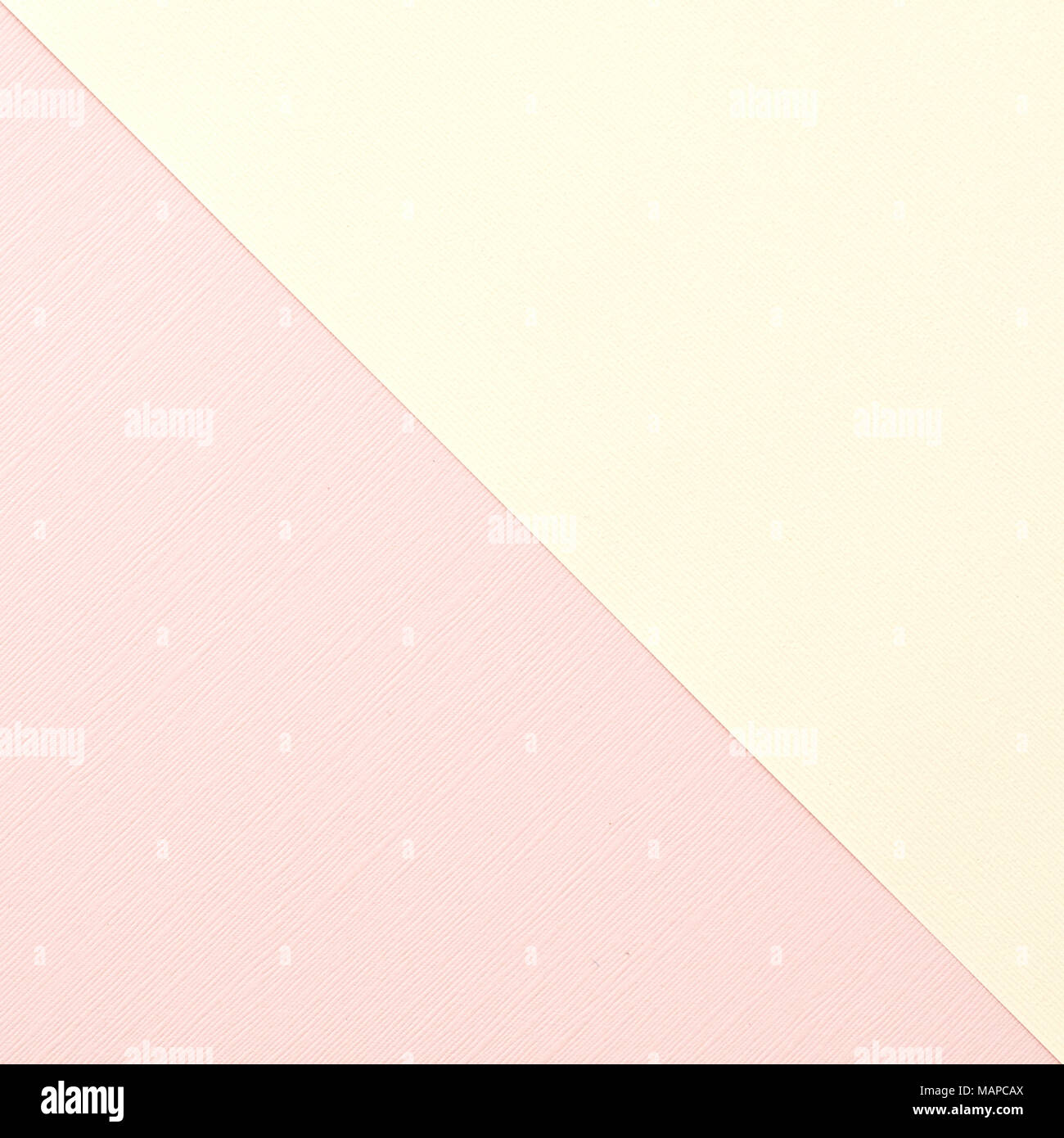 Yellow and pink blush two toned paper background textured image for copy or text overlay Stock Photo