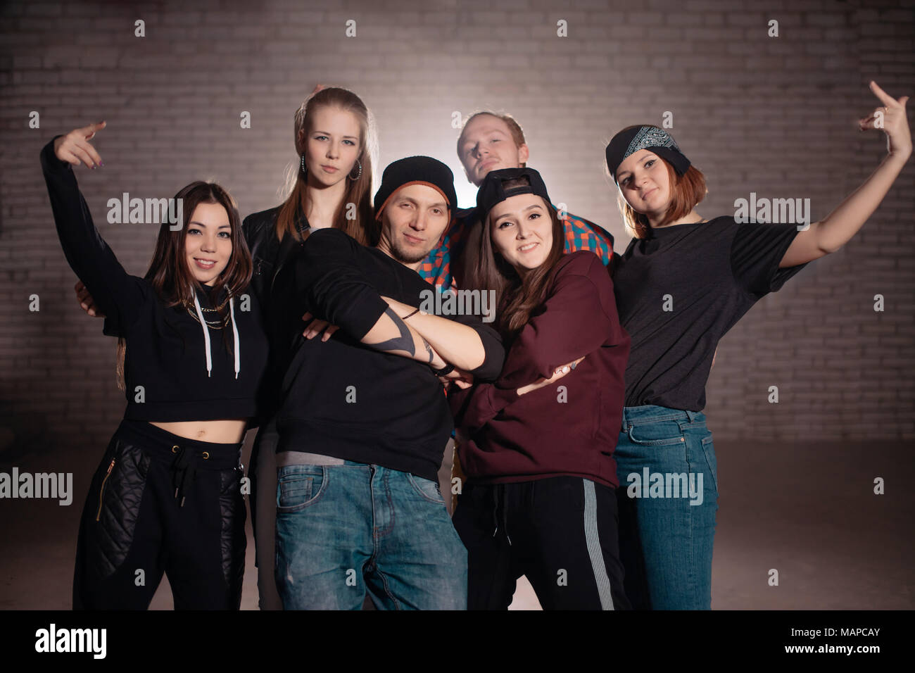 Gang Of Youths posing to camera on the street Stock Photo