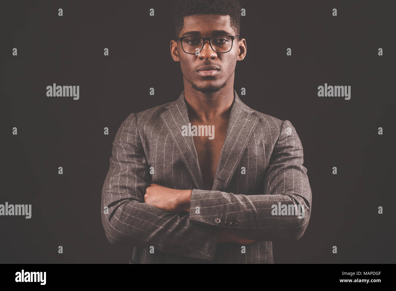 African man glasses serious isolated hi-res stock photography and ...